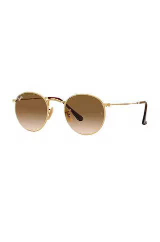 Ray-Ban Round Metal in Gold from Revolve.com | Revolve Clothing (Global)