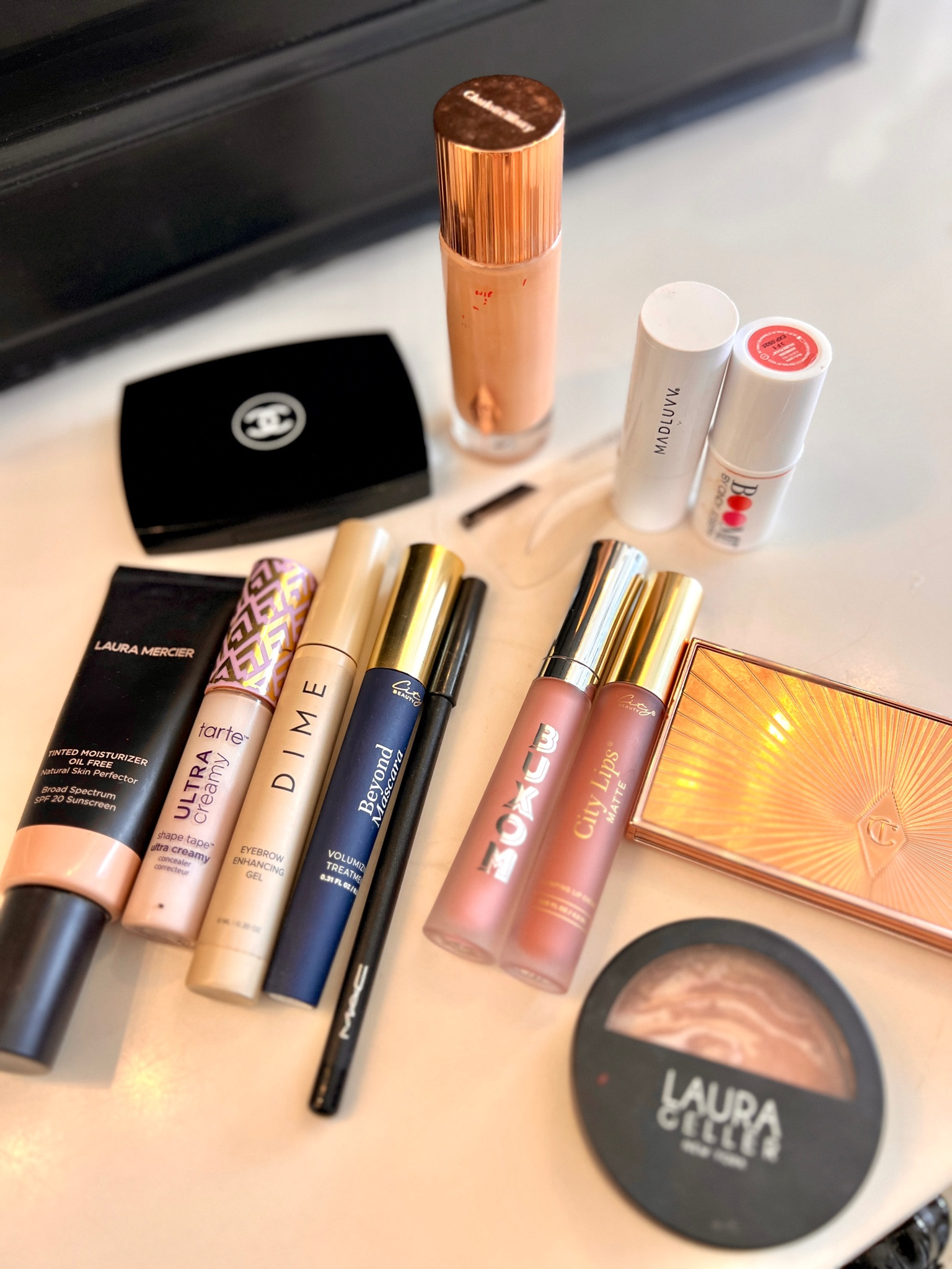 My regular make up I use on the daily

Chanel powder 
City beauty lip and gloss 
City beauty or Grand lash mascara 
Charlotte tilbury highlighter 
Eyebrow kit
Dime eyebrows 
Laura Mercer foundation 
Tart shape tape 

Charlotte tilbury flawless filter
Laura Geller baked beauty 

#LTKBeauty #LTKGiftGuide #LTKStyleTip