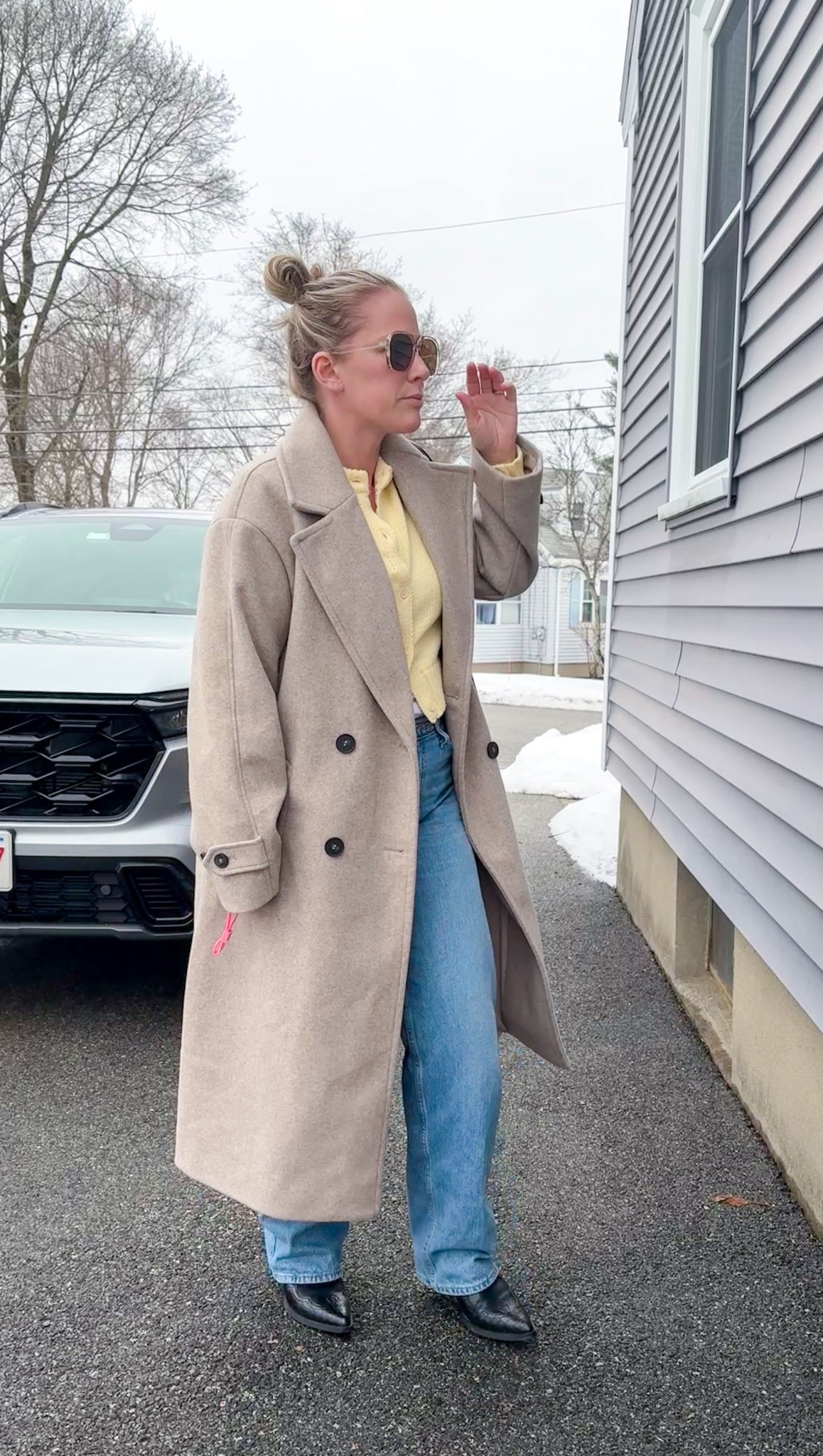 Butter yellow knit and Levi’s denim 
Dad jeans 
Beige oversized wool jacket trench 
Pointy toes western boot 
Designer inspired sunglasses 

#LTKPetite #LTKootd #LTKdayinmylife