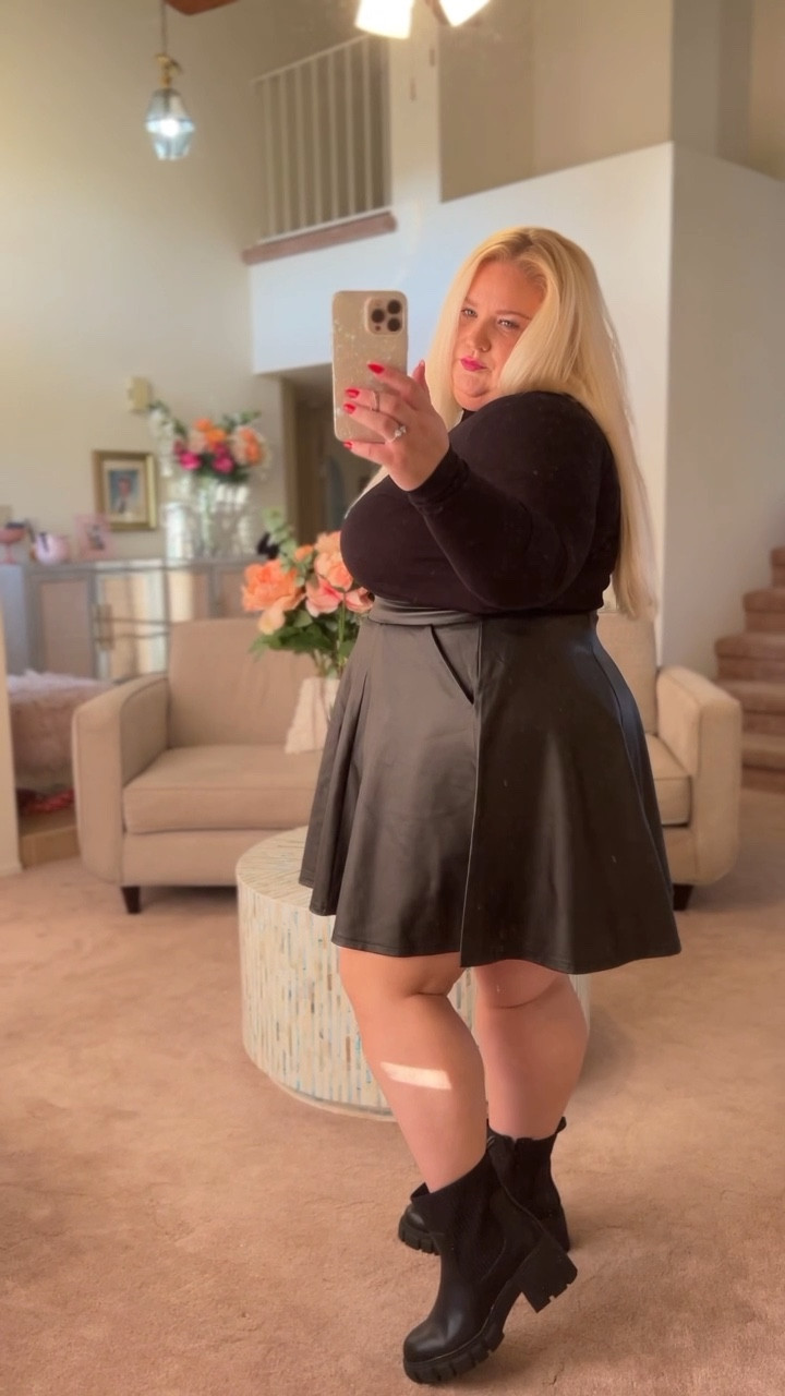 All black with a pop of color 
Black leather skirt  plus size style

#LTKcurves #LTKunder50 #LTKsalealert