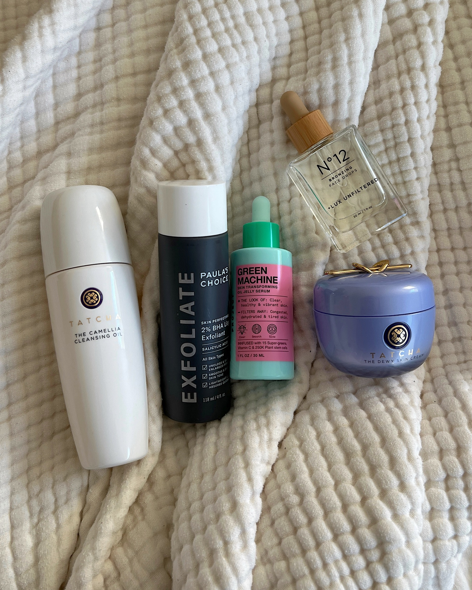 AM skincare today! Tatcha cleansing oil is so soft and gets leftover makeup off so well, esp if I’m not showering that morning I love to use in the am to cleanse before skincare! Paula’s choice exfoliant I apply with a cotton pad and it helps clear pores & smooth skin texture. Green machine by inn beauty has vitamin C & reduced redness. Tatcha moisturizer is the mist hydrating & thick cream it’s so good! And just did a few tanning drops for a glow. I apply over skincare & wash hands thoroughly after! 

#LTKbeauty #LTKunder100