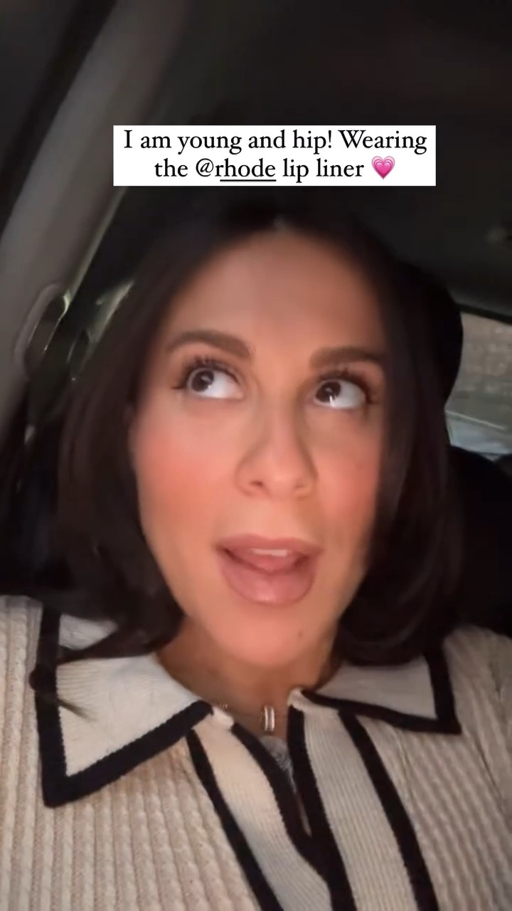 I am young and hip! Wearing the rhode lip liner in twist 🖤