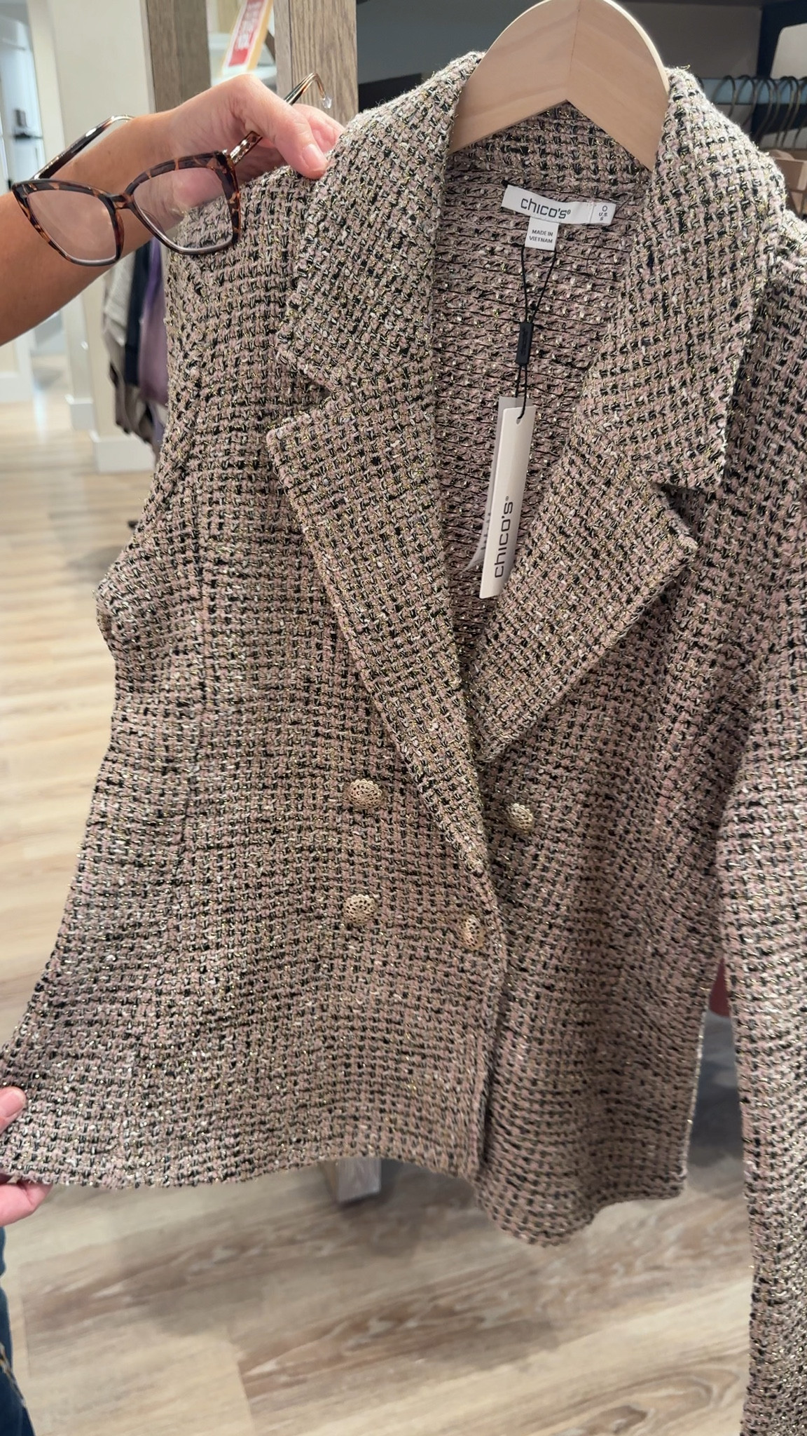 Showcasing classic blazer qualities including peak lapels, as well as a double breasted motif with bottom button closure. A sparkly metallic accent and goldtone buttons help elevate this jacket. Featuring thin removable shoulder pads, to add structure and shape.
Classic, double breasted tweed blazer

#LTKWorkwear #LTKOver40 #LTKHoliday