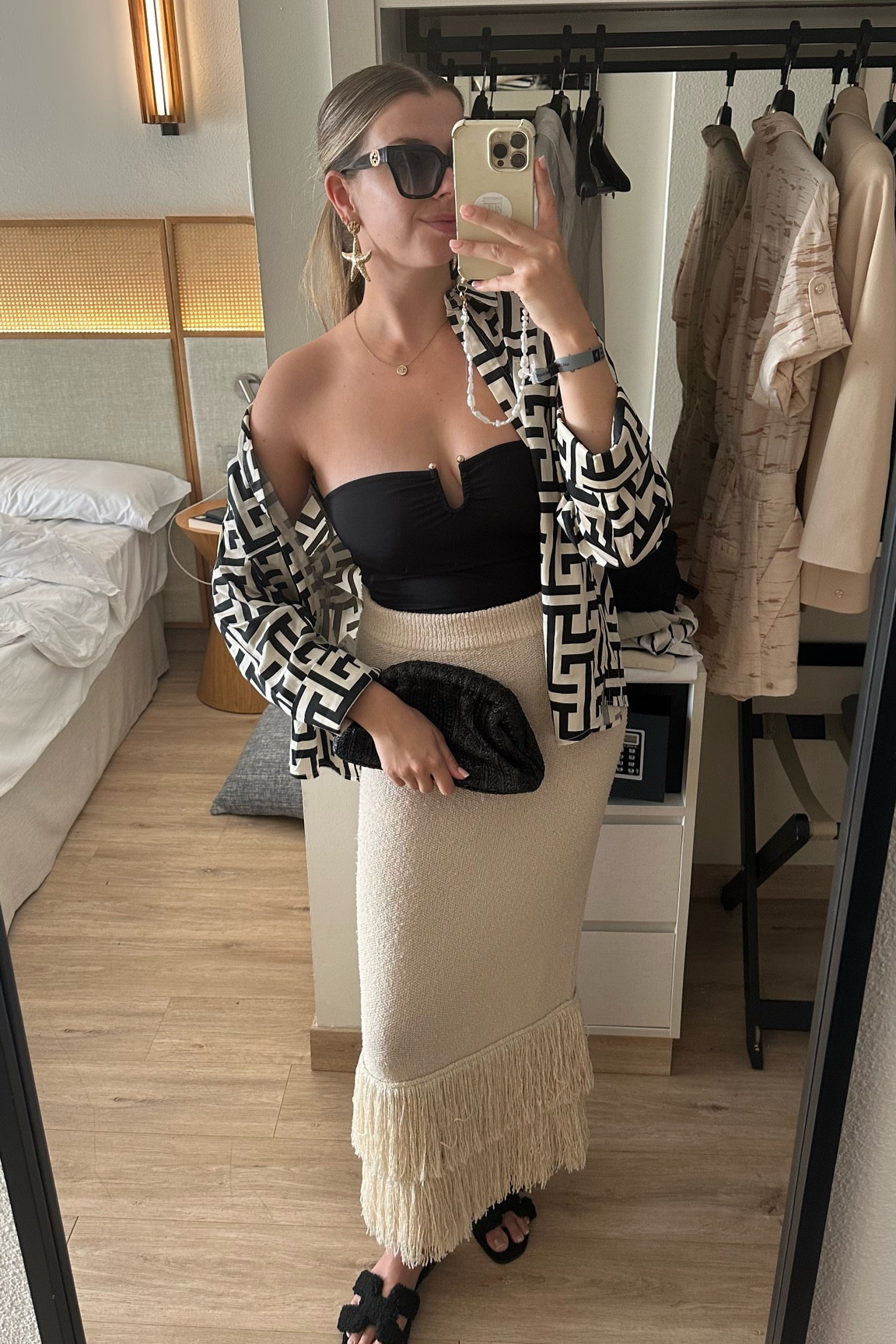 Perfect beach day outfit! 

Full H&M/& Other Stories outfit: black swimming suit, beach skirt and a Fendi inspired blouse. Wearing glasses from Gucci, a COS bag and Hermès inspired sandals. Wearing a selfmade pearly cord on my phone 🖤🤍

#LTKtravel #LTKswimwear #LTKeurope