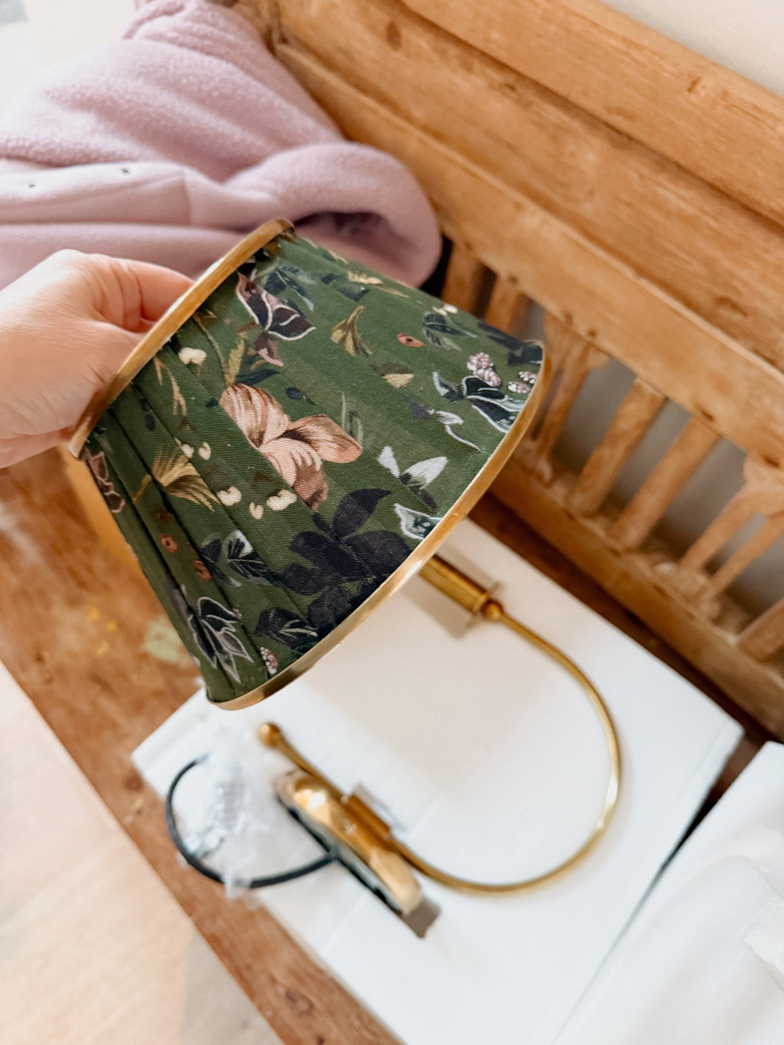 Sconces to add color to the living area. Green, pink, gold and gray  