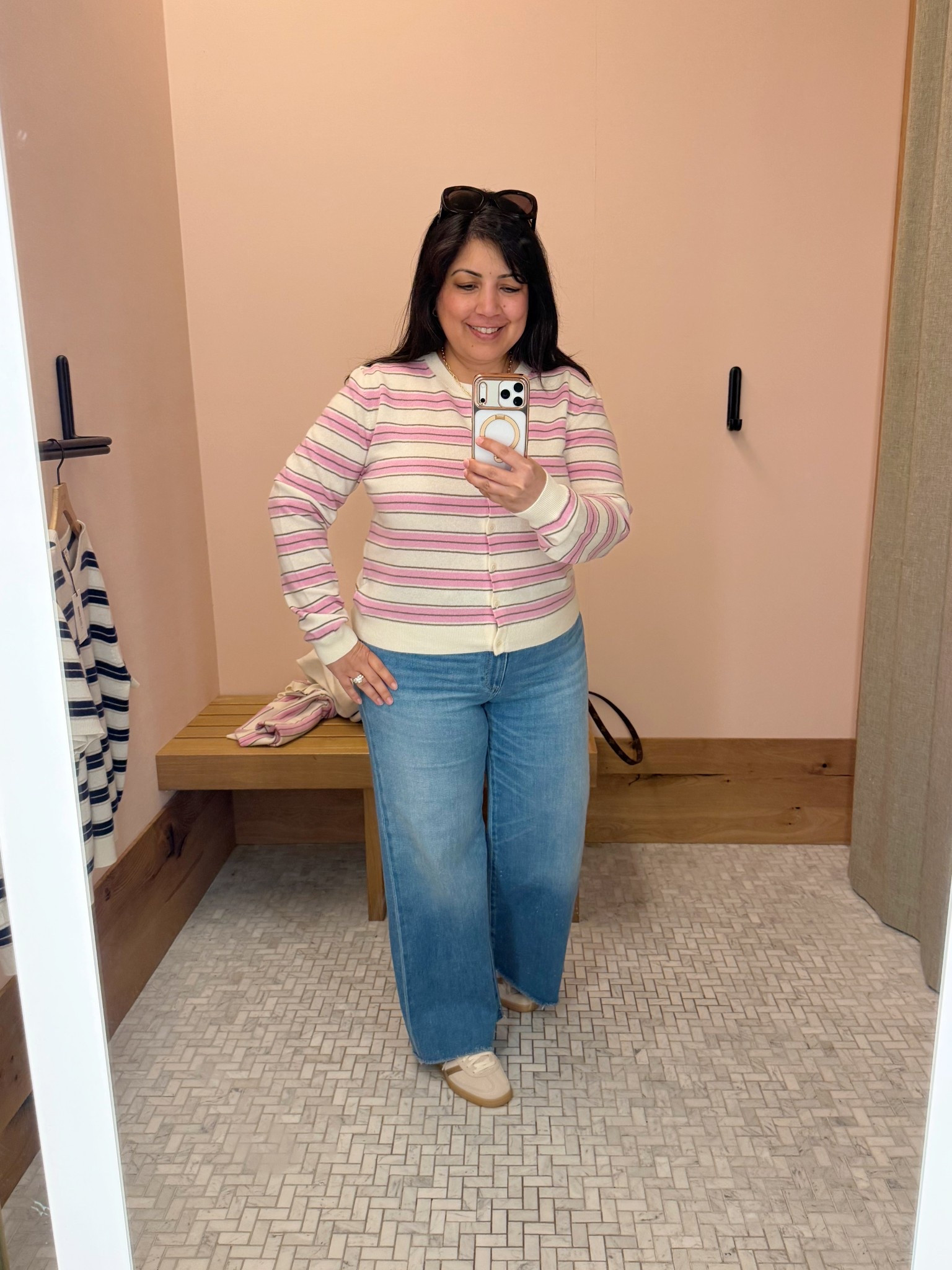 Love this striped cashmere cardigan for transitioning from winter to spring! Such a pretty color palette that can be paired with jeans, pants, shorts and skirts. I paired it with wide leg jeans here but this cardigan would also be perfect with the viral Aritzia lodge pants that can be dressed up or dressed down and make the perfect workwear or travel outfit! 

#LTKMidsize #LTKPetite #LTKOver40