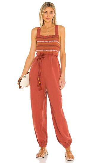 Sienna Smocked Jumpsuit in Sumac | Revolve Clothing (Global)