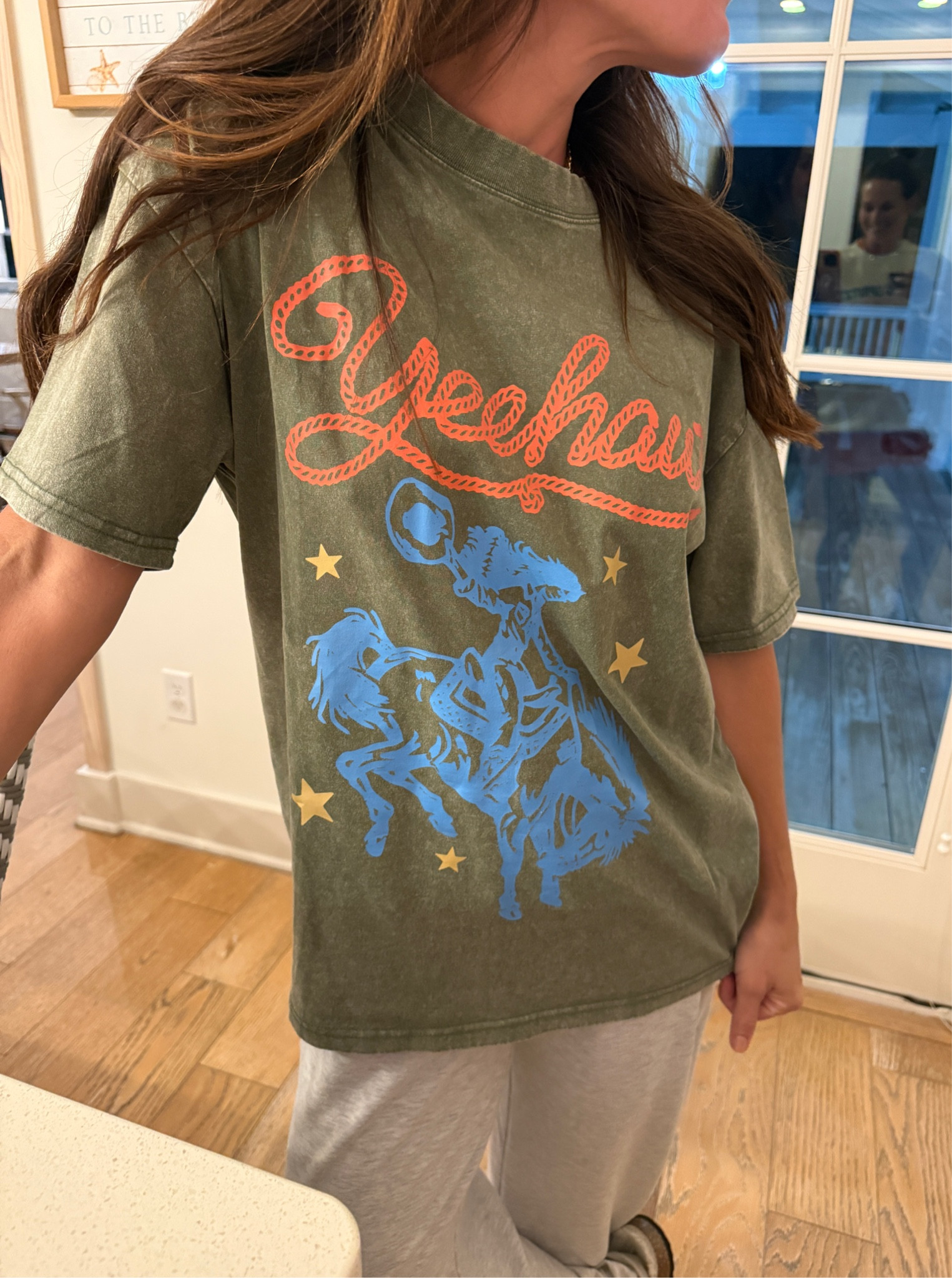 My friends cute new graphic tee off Amazon! Fits oversized cutest pattern #casualoutfit #amazonfashion 

#LTKootd #LTKSaleAlert #LTKgrwm