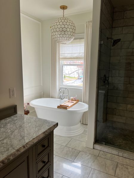 This molding makes such a difference in this space! I got lots of questions about this chandelier/pendent. Linking it here!
.
.
.
Bathroom renovation. Serena and Lily. Classic decor 

#LTKVideo #LTKhome