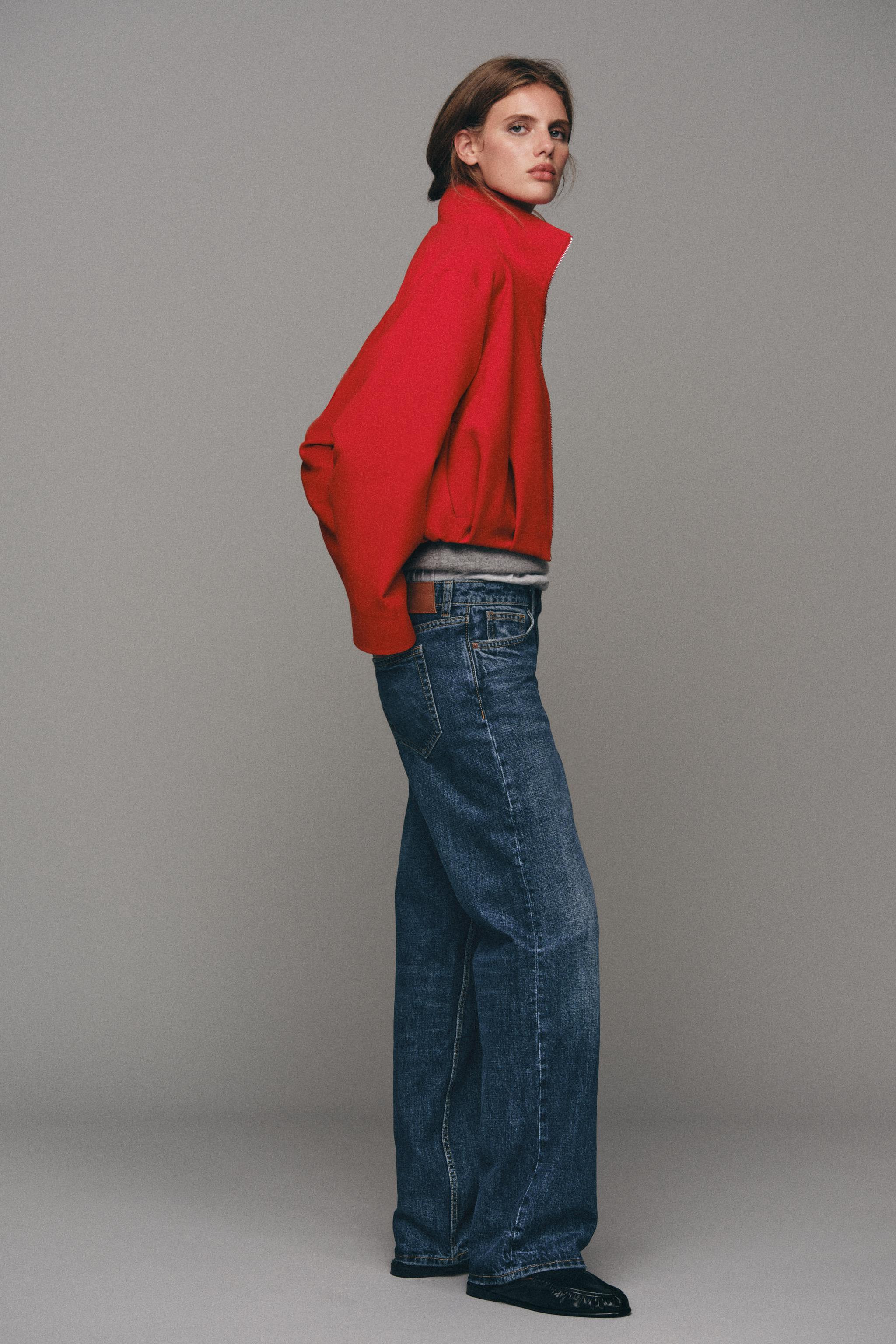 Bomber-style jacket with a high collar and long sleeves. Featuring hidden side pockets in the sea... | Zara UK