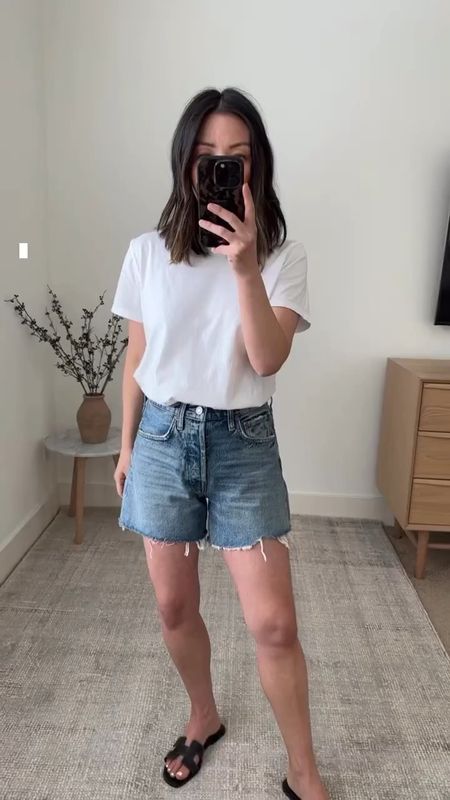 AGOLDE Parker Long Shorts. Run TTS, but I would size up. Don’t love the flare/large leg opening on me. I prefer a 3” inseam on my petite frame  

Color: Wheel
Inseam 4”
Size: 24

Tee - Everlane medium 
Sandals - Hermes 35

Spring style, denim shorts, jean shorts, best jeans shorts for petites, petite style, minimal style, vacation outfit. 


#LTKSeasonal #LTKstyletip #LTKunder100