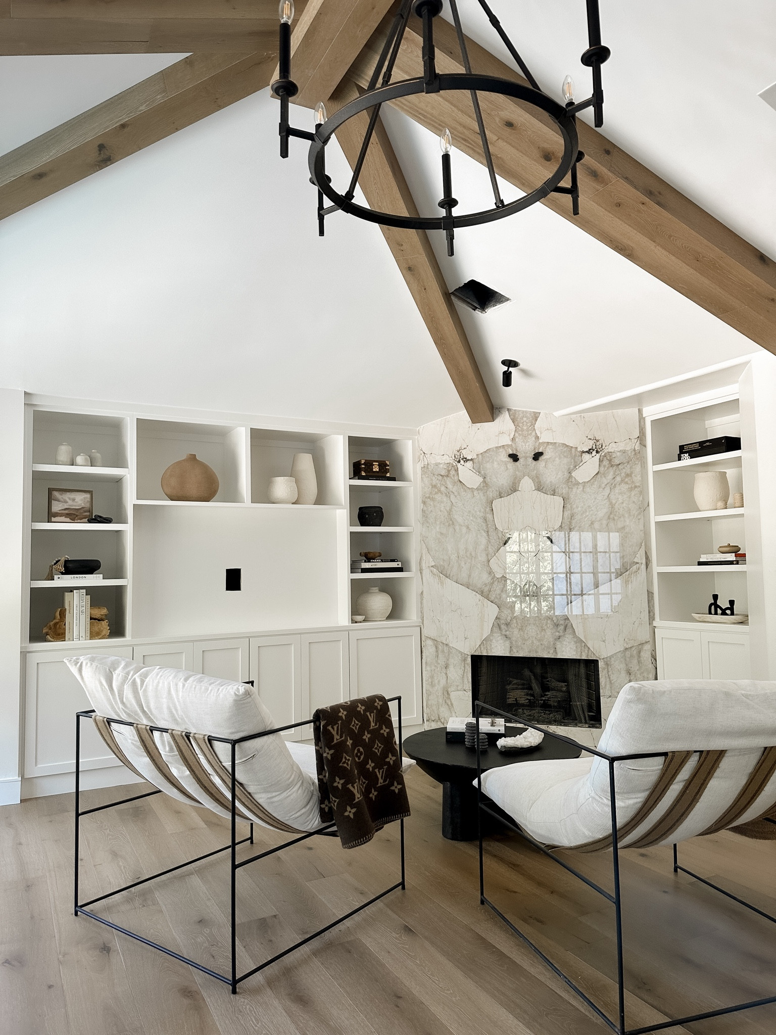 So cozy and serene! 

Recreate this look in your home with a modern black coffee table and polished accessories. 

Amanda’s chairs are from Croft House, but we found you a couple of similar options. 

— Kimberly | Team AF 

#LTKfindsunder50 #LTKhome #LTKfindsunder100