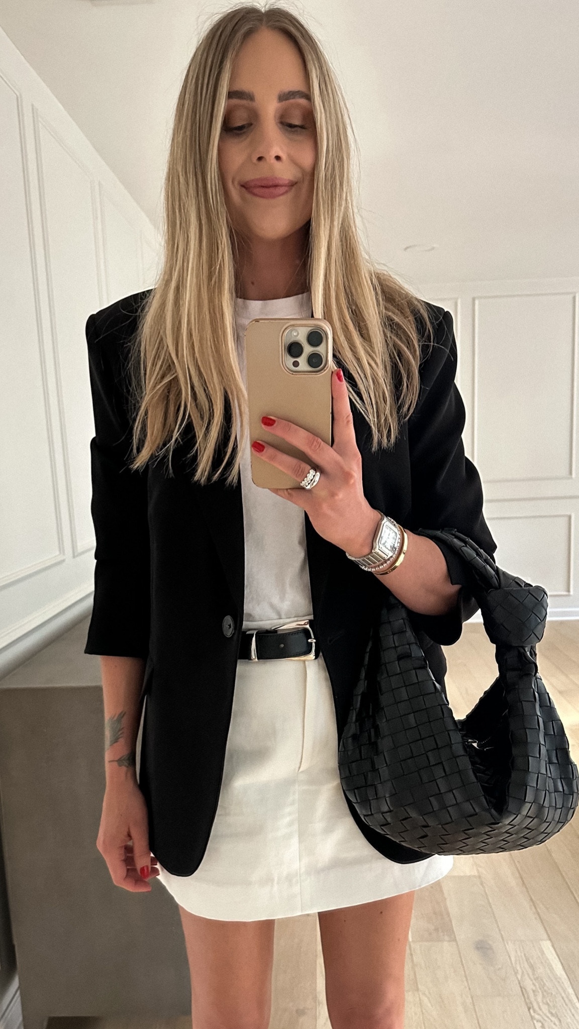 Fashion Jackson wearing black blazer (small) white tshirt (size 0) white skirt (I sized up so it would be a little longer but it’s loose on me), black belt, white heeled strappy sandals #fashionjackson #nashvilleoutfits #springoutfits #summeroutfits 

#LTKStyleTip #LTKFindsUnder100 #LTKOver40