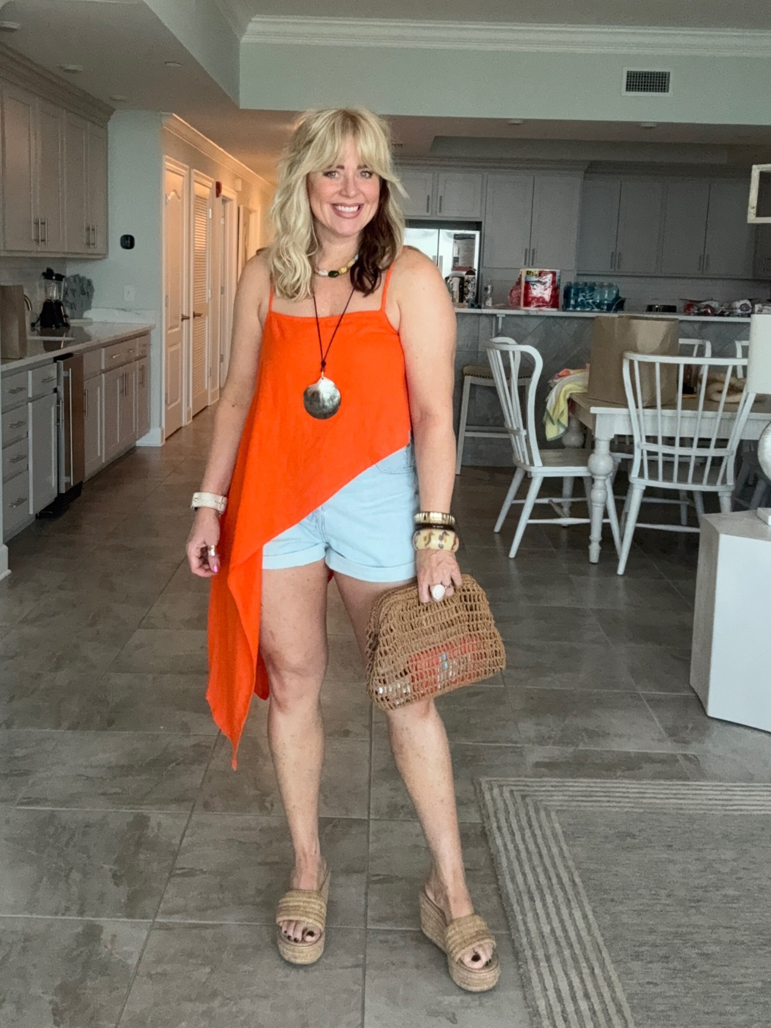•This top is so much fun! I love the sharp asymmetrical hem! It comes in 5 colors and I’m in a small
•My denim shorts I’m wearing are so comfy, come in more washes, and for true to size. 
•Strapless bra is amazing comes in lots of colors, under $20 and on AMAZON PRiME DAY
•Sandals run true to size too.