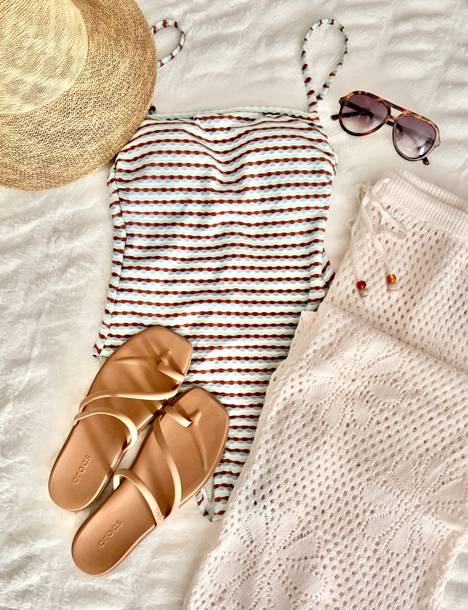 Love this Target swimsuit! Full coverage & comfortable ribbed material with adjustable straps! Crochet pants are super cute too! 
Swimsuit: tts, Crocs: tts

#LTKSwim #LTKTravel #LTKOver40