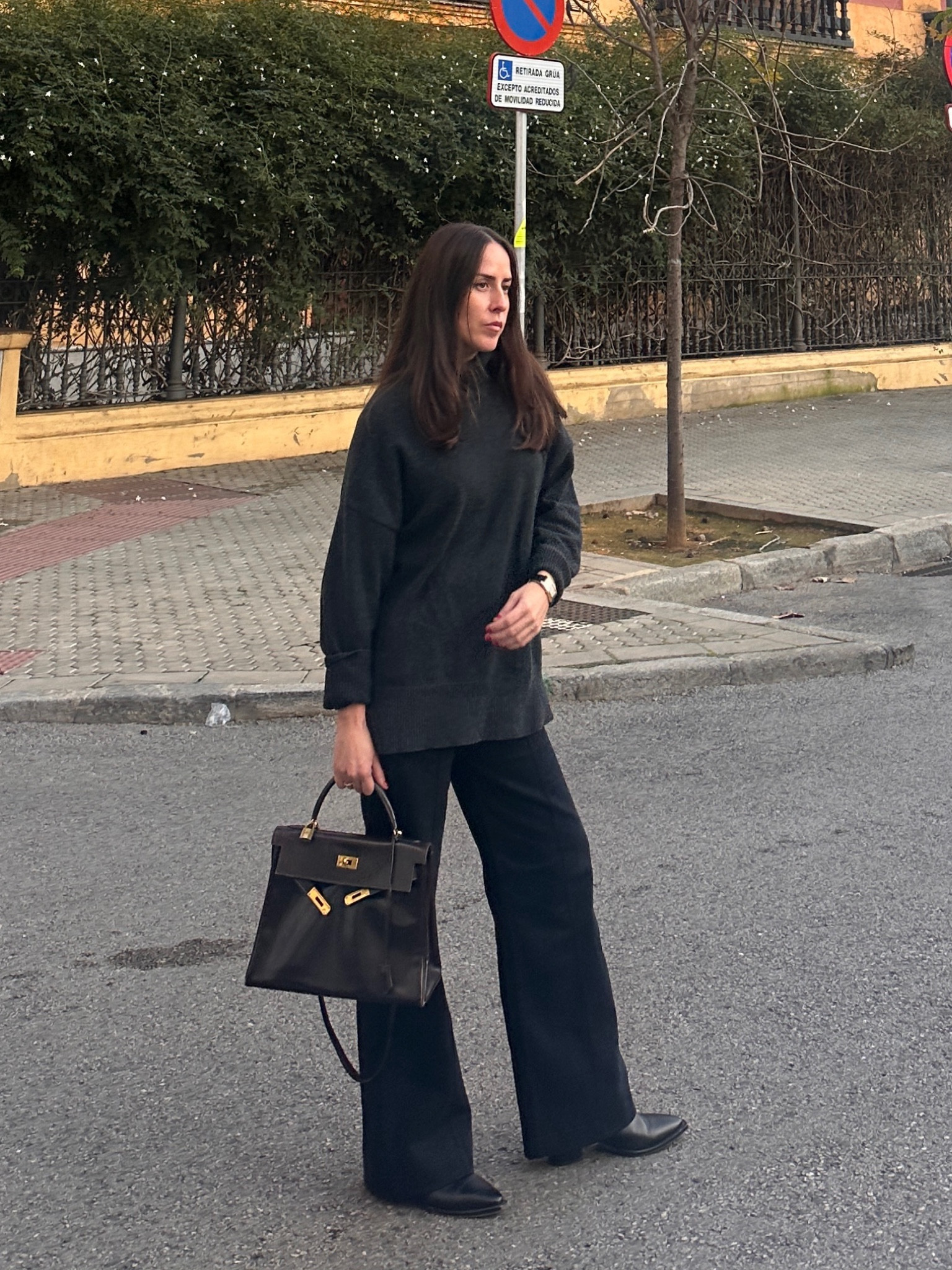 This outfit incorporates a dark grey sweater, dark blue jeans and boots, and a dark bag - colors that one would think would clash but I absolutely love it. 😍 

#LTKSeasonal #LTKGiftGuide #LTKstyletip