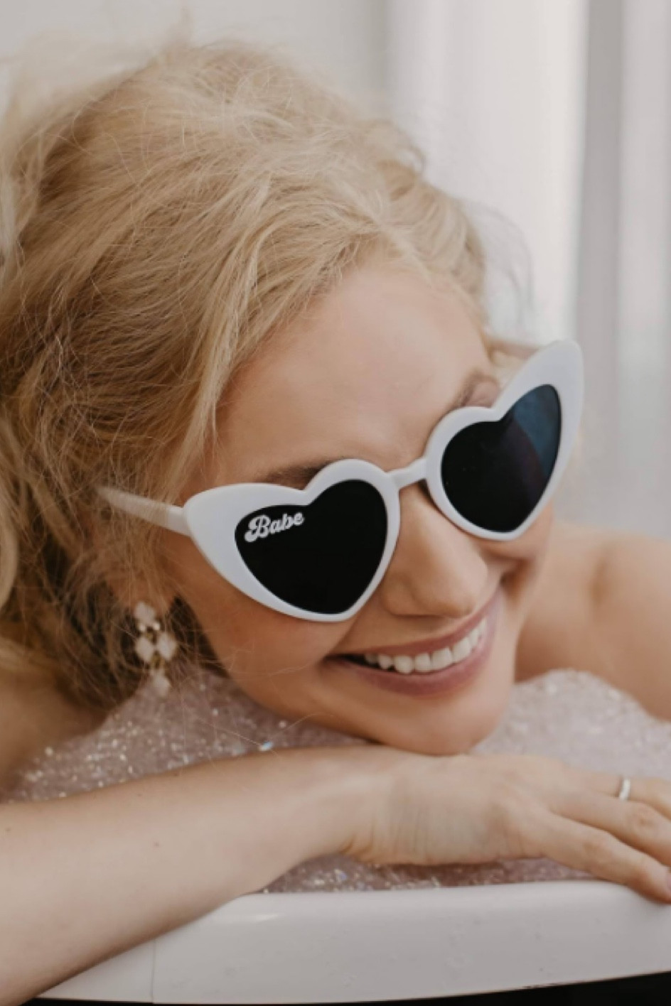 Heart shaped bridal sunglasses (linked a few with nothing written on them.)  

#LTKtravel #LTKparties #LTKwedding