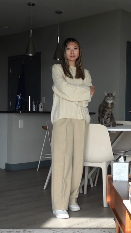 Casual chic winter to spring transitional outfit with oversized white cable knit cashmere sweater, beige wide leg pants and white sneakers

#LTKstyletip #LTKFind #LTKSeasonal