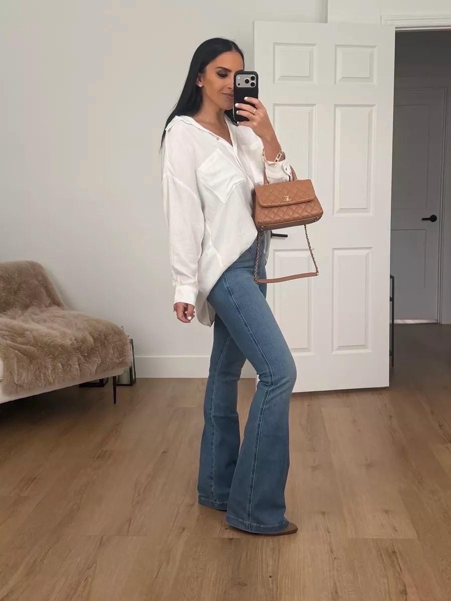 Spanx Original Everywear Flare Jeans now $49 originally $148 wearing size 8

M