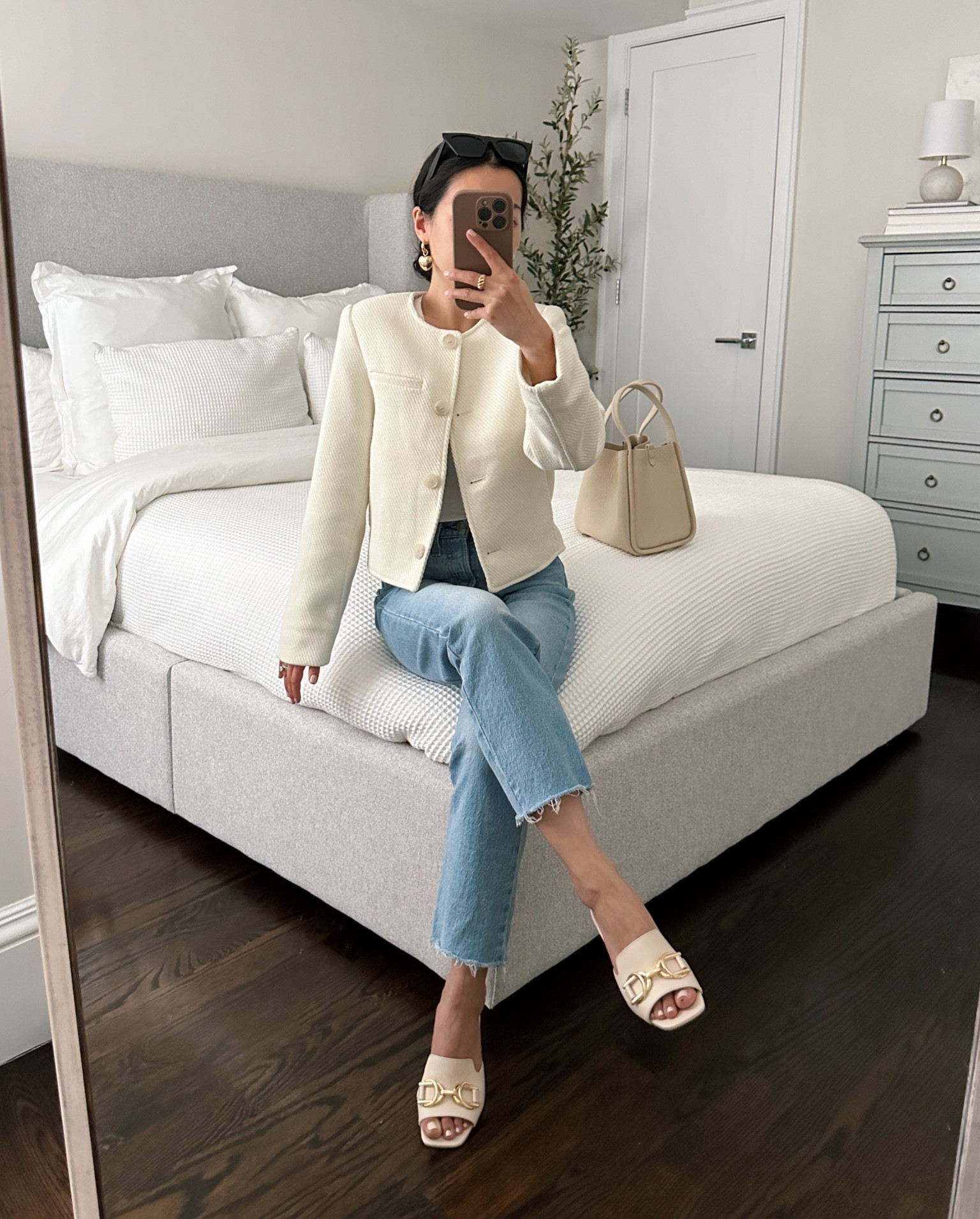 winter to spring transitional casual outfit 

• h&m short jacket in XS, under $60. Also in black! They will have occasional site wide sales for a further discount, and I also linked a few h&m handbags with good reviews. 

Jacket is nicer quality than I expected and has the slightly boxier modern fit I was looking for. Substantial feeling, medium weight textured twill and lined. Room to layer a sweater on me.

Sleeves are shown in this pic on me at full length - a little long on petites so I’d wear them folded under a bit or shortened. 

• levi's wedgie straight jeans 25 with hems cut. I love this cut and usually wear a 24x26 , but for this pair i sized up to a 25 for a looser fit and got regular length then cut the hems. A 26 length would work well with no cutting needed!

• amazon bodysuit tee Xs, a soft and comfy staple 

• ann taylor cream mule sandals 5 - reminds me of Gucci style and is nice quality as well as comfortable with the medium height block heel. TTS for the brand, I took my usual size 5

• songmont cream bucket bag

#petite smart casual work outfit 

#LTKworkwear #LTKfindsunder50 #LTKSeasonal