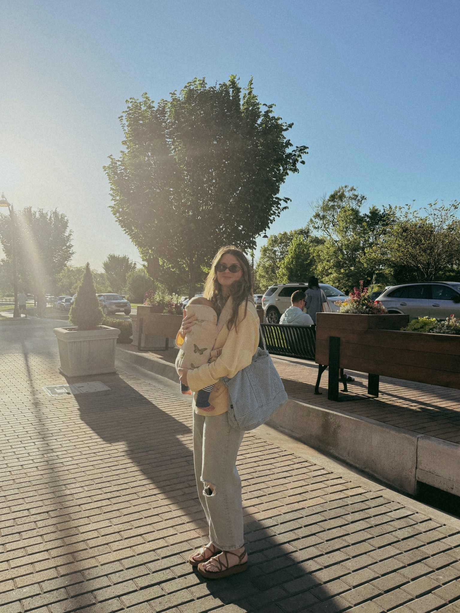 wearing a small in top and sized up 2 in jeans postpartum! Favorite baby carrier, this print restocked but so many pretty options! 

Spring outfit, mom outfit 

#LTKmomlife #LTKootd