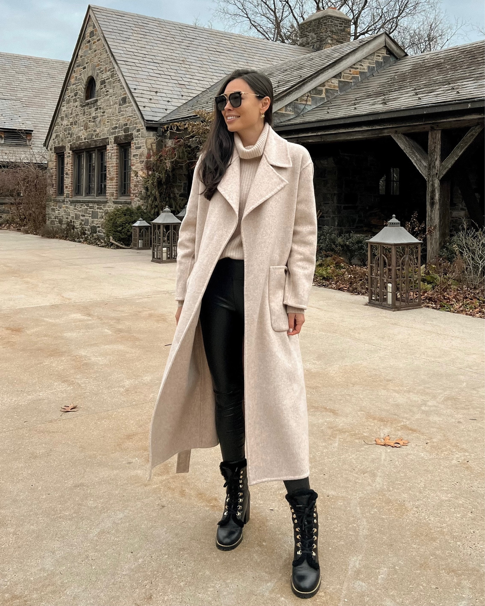 Kat Jamieson of With Love From Kat wears a winter outfit. Cashmere sweater, light beige coat, faux leather leggings, lace up black booties, neutral style, classic style.

#LTKshoecrush #LTKSeasonal #LTKstyletip