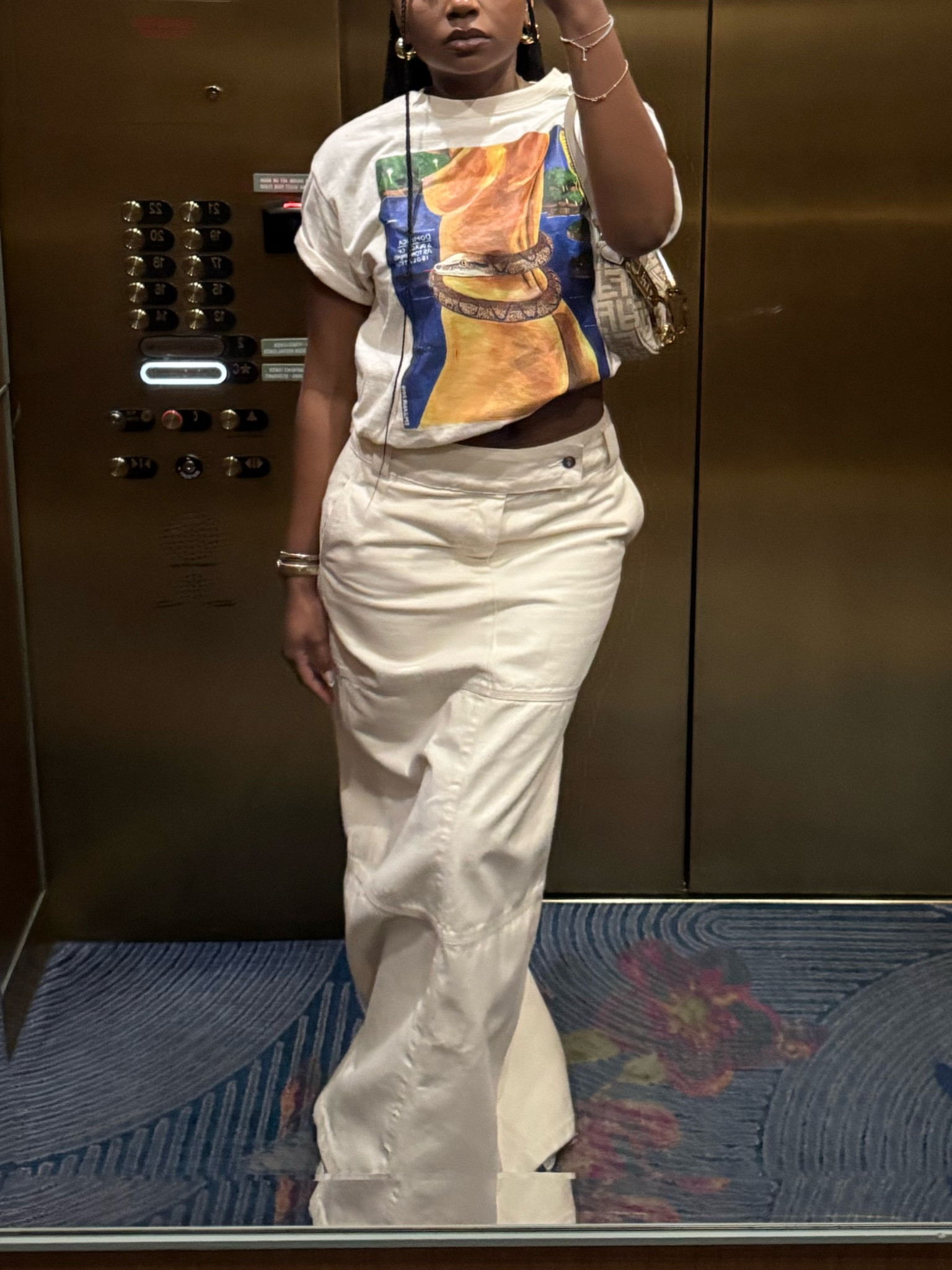 OBSESSED with this skirt from Helsa!! It’s half off right now 🤍 top is from an artist in nyc!! his insta is @emandahr