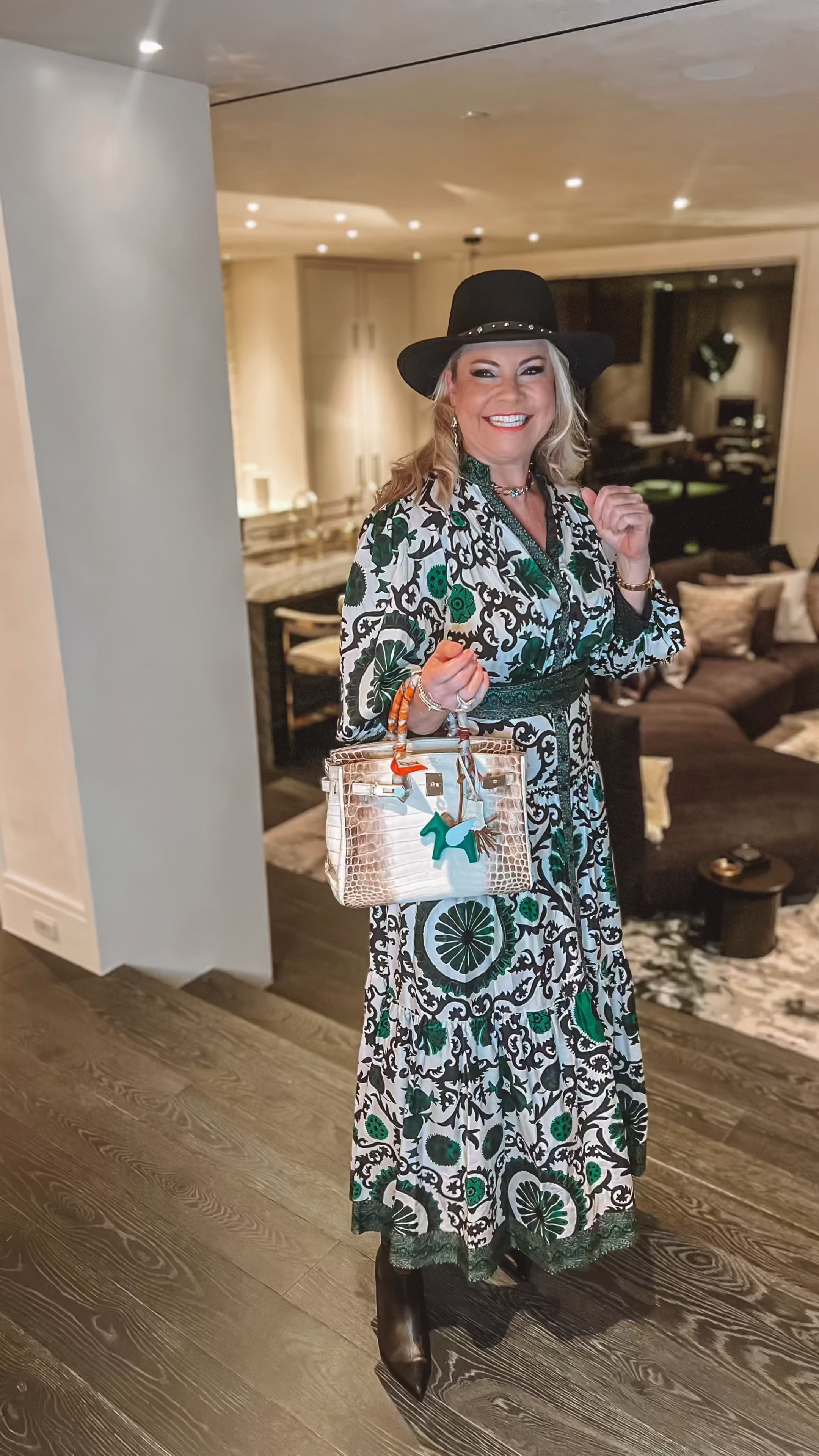 Spring sale starts here with this Alice and Olivia green spring dress, paired with my Stuart Weitzman boots. And of course my new birkin bag. 💼 

#LTKsalealert #LTKover40 #LTKSeasonal