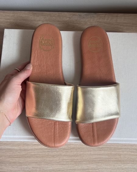 Metallic slide sandals size up if between sizes! 

#metallicsandals #sandals #shoes #summershoes

#LTKshoecrush #LTKSeasonal #LTKFind