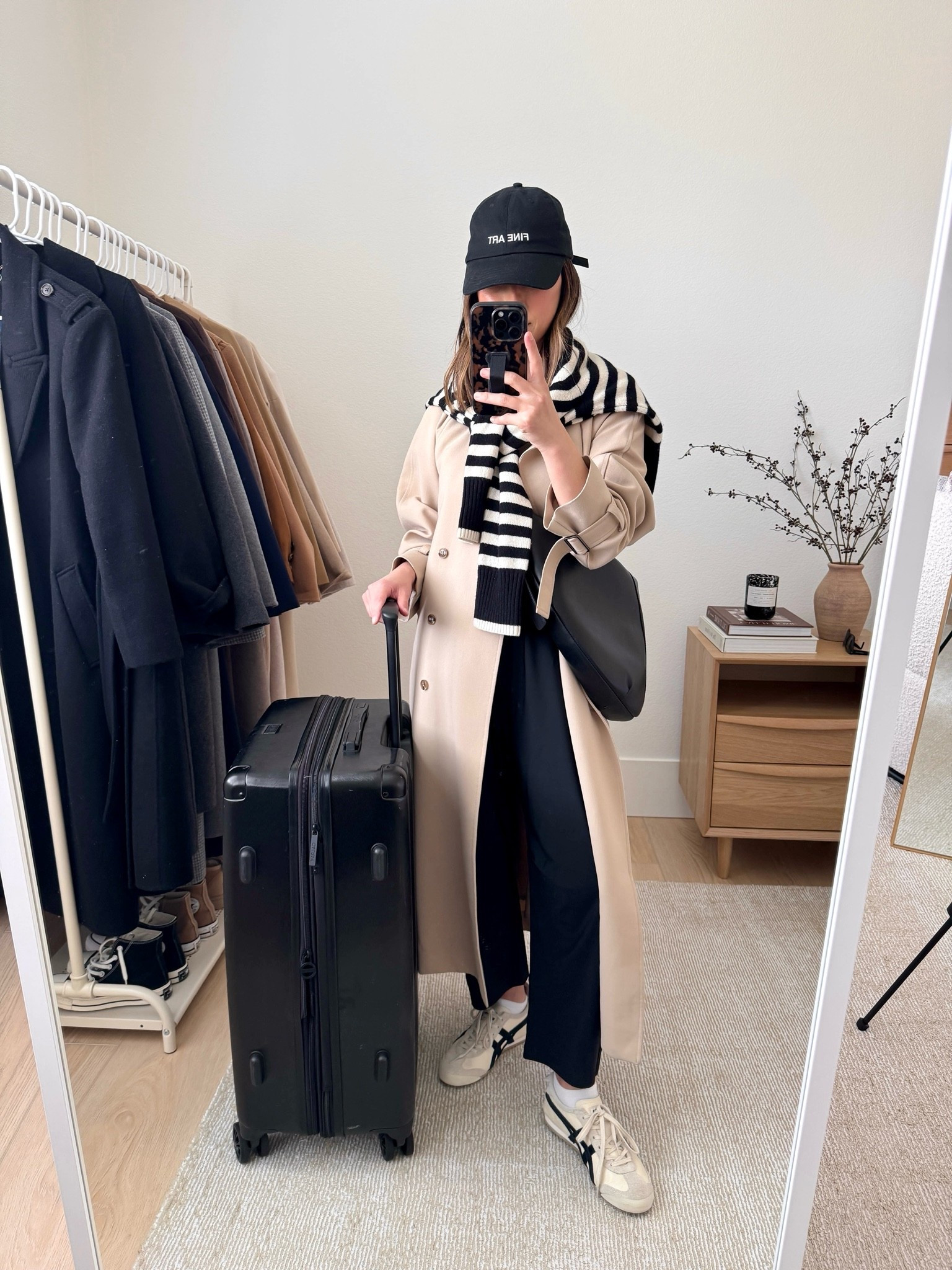 European travel capsule outfit. This is for more of spring time, but you can take bits and pieces out if you go in the summer. I always try to wear the most when traveling, to make more room in my suitcase. 

Oak & Fort Trench xxs. Runs big
Old Navy leisure pants petite xs
Onitsuka Tiger sneakers 4 mens. Run big
Everlane sweater xs
Fine Art hat (old)
Madewell bag
Calpak suitcase

#LTKPetite #LTKTravel #LTKootd