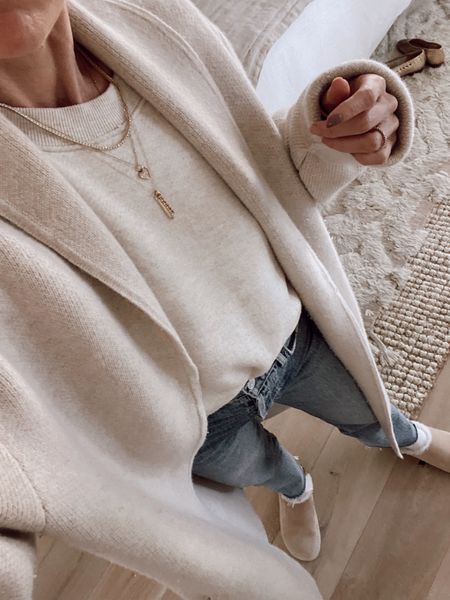 Today’s outfit 
Sweatshirt (SHANNONP15 for 15% off)
90’s jeans 
Shearling clogs (15% off SHANNONP15) 
Ivory sweater coat (35% off with code OT35) 

#LTKstyletip