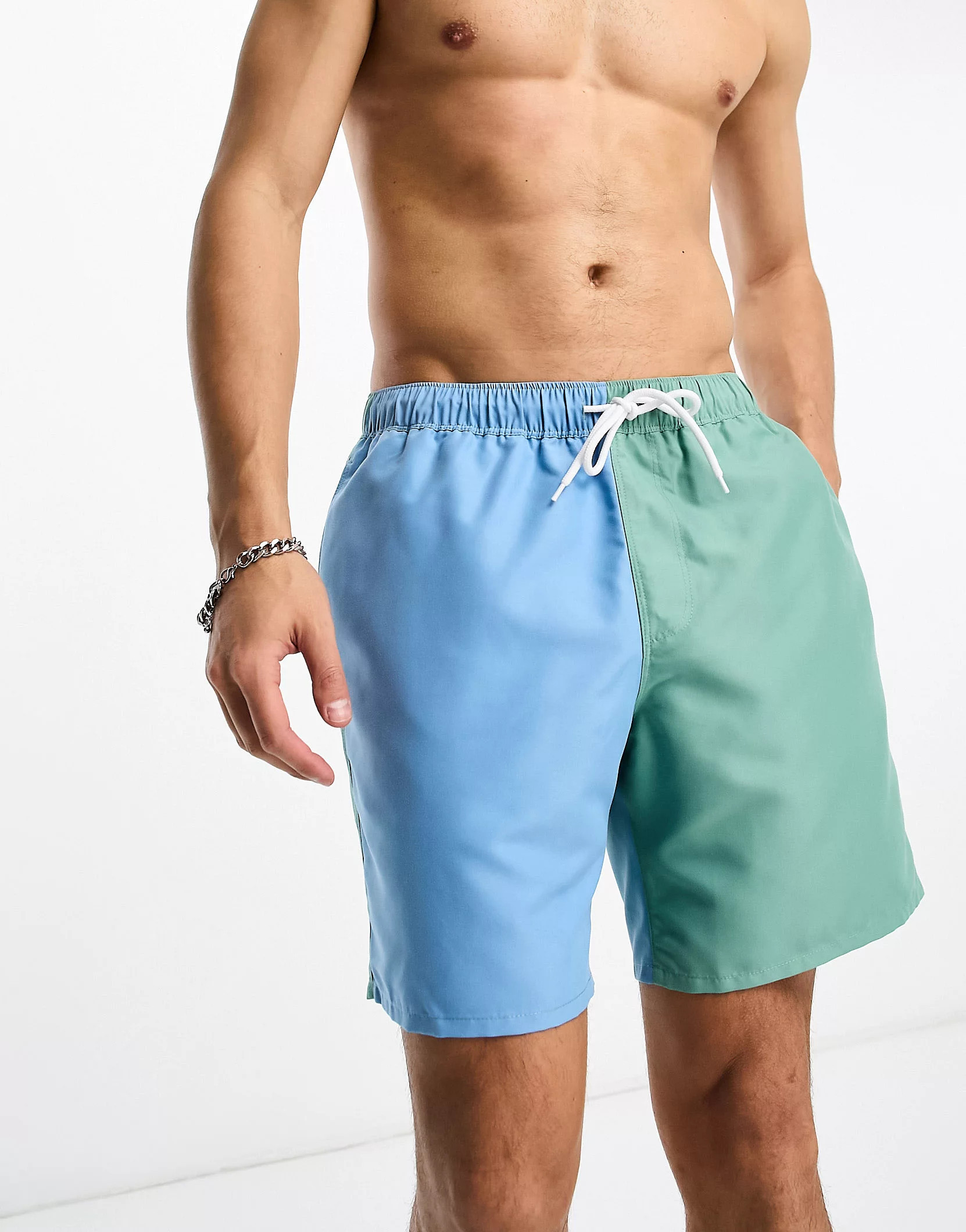 ASOS DESIGN swim shorts in mid length in color block print | ASOS (Global)