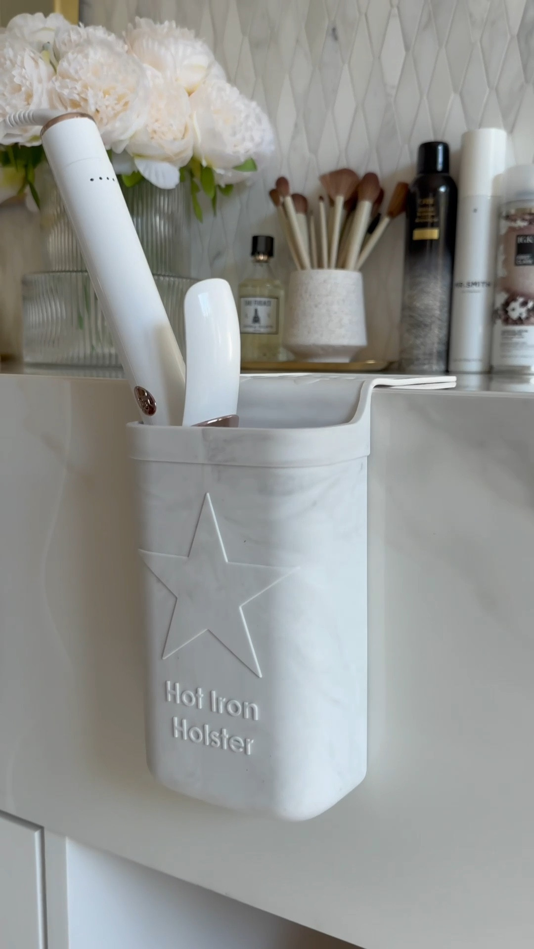 Scroll to shop! Follow for more! Amazon anti-adhesive silicone holster!! It sticks right on the counter WITHOUT any adhesive!!!🤯🤩👏🏼👏🏼 Perfect for traveling too & heat resistant to 500°F for your fav curling iron, straighteners- any of your favorite hot tools!!😍 

#LTKGiftGuide #LTKFindsUnder50 #LTKBeauty