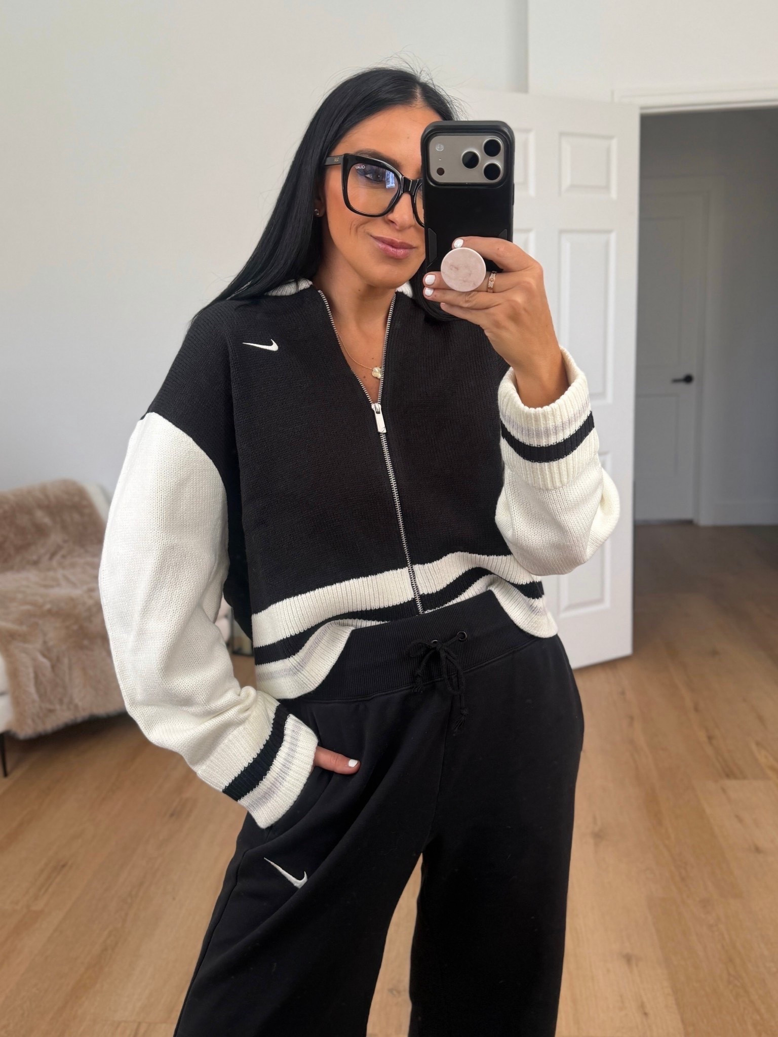 Nike Sportswear Women's Cardigan wearing size small. Nike Sportswear Phoenix Fleece Women's High-Waisted Wide-Leg Pants wearing size small. 