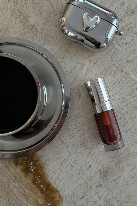 The new lip oils from Clarins are so gorge, they’re like putting honey on your lips. Check out my next post to see what this looks like on me 💋 💋
Dark red lip gloss | Cherry red | Holiday makeup | Beauty ideas for summer | Silver heart AirPods case | Silver chrome cup saucer 

#LTKsummer #LTKbeauty #LTKhome