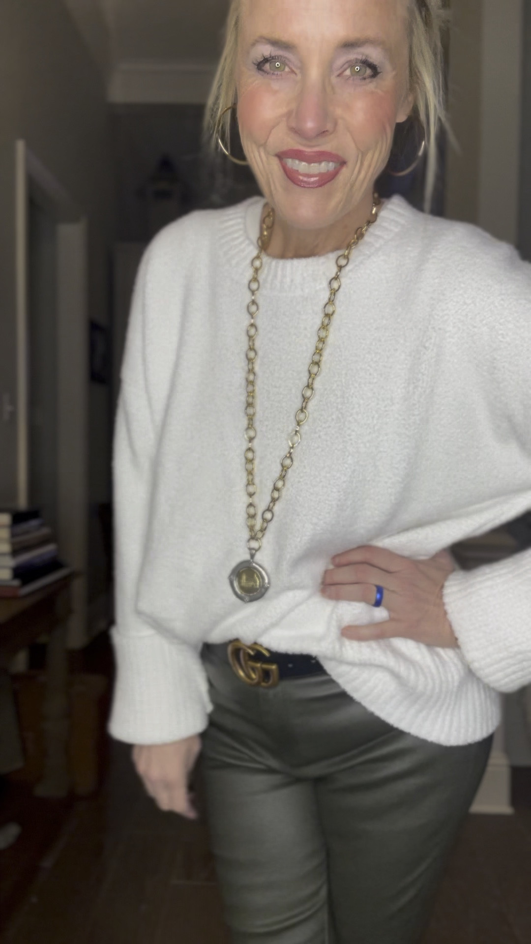 I love how inexpensive yet well made and versatile both of these pieces are. The first time I wore this sweater in blue from Pretty Garden, I wore it tucked into a pleated miniskirt with a belt for a cute date night look. Today it’s untucked and super casual. The material feels like I’m wearing a Barefoot Dreams blanket! Y’all know these faux leather skinny pants from Shein are on repeat for me. I have them in 4 or 5 colors because at under $20, it just makes sense. I’m in a medium in both. 

I’ve accessorized today’s outfit with a Jennifer Ponson necklace and bracelet, my favorite gold hoops and gold bracelets from Amazon, my personalized bracelets from Etsy, my faux GG belt and black cowboy boots. 

#winteroutfit

#LTKsalealert #LTKSeasonal #LTKover40