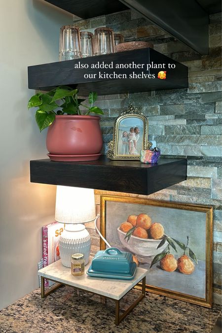 Open kitchen shelves! Pink glasses are from IKEA, bowls are Anthropologie and I linked similar. Photo frame is from Homegoods but I found some really cute similar ones. Tiny pot was made by one of my kids. Linked the other items! 🥰