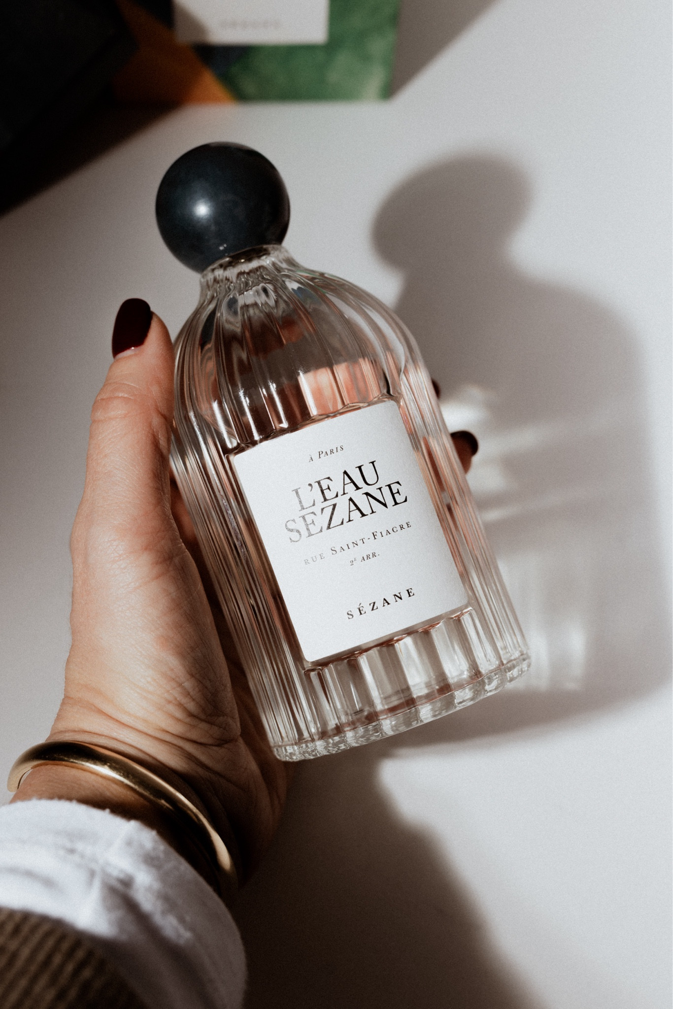 If you’ve ever shopped at Sézane store before or received a package from them there’s absolutely no doubt that you’ll remember that as soon as you open the box and unwrap the tissue you’re greeted with their signature Parisian scent. It’s like no other scent and the way Sézane is describing it: “it’s the scent of fresh summer laundry, dried in the afternoon sun.” To tell you the truth I agree. L’Eau Sézane is finally available for purchase online! 
New packaging but same old recognizable scent. I am obsessed. 

#LTKFindsUnder100 #LTKStyleTip #LTKSeasonal