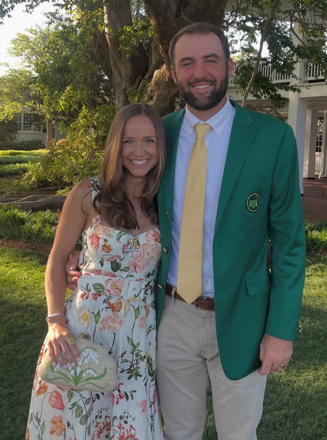 Meredith Scheffler floral belted dress and straw natural woven embroidered clutch bag

#LTKStyleTip #LTKParties