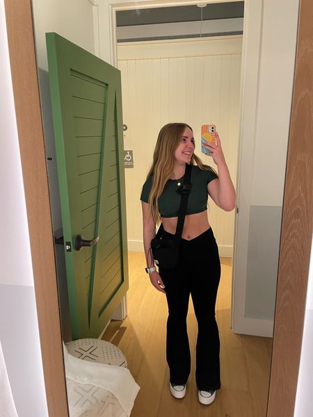 my ootd for work at aerie! 💚 loving these black aerie crossover flare leggings and green smoothez bra top + my green converse!

#LTKfindsunder50 #LTKstyletip #LTKworkwear