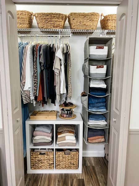 The most organized reach in closet ever! The bottom baskets hold shoes and handbags, the small baskets in the hanging organizer hold socks and underwear, and the baskets on the top shelves hold hats, bed sheets, and off-season clothes. 

#LTKhome