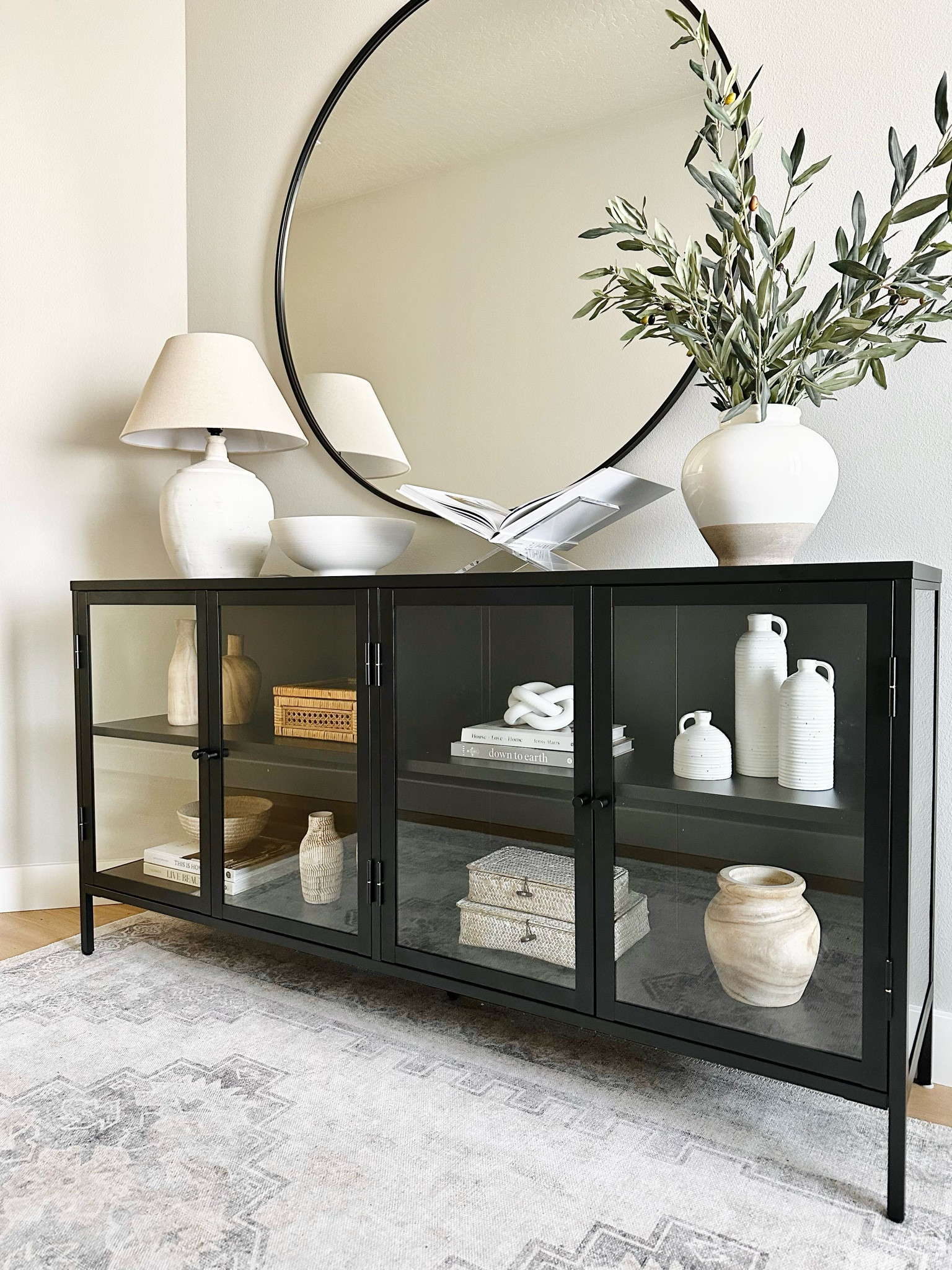 Entryway design, entryway decor, glass cabinet, shelf decor, shelf styling, decorating, table lamps, stems and vases, olive stems, entryway rug, vintage rugs

#LTKstyletip #LTKhome #LTKsalealert