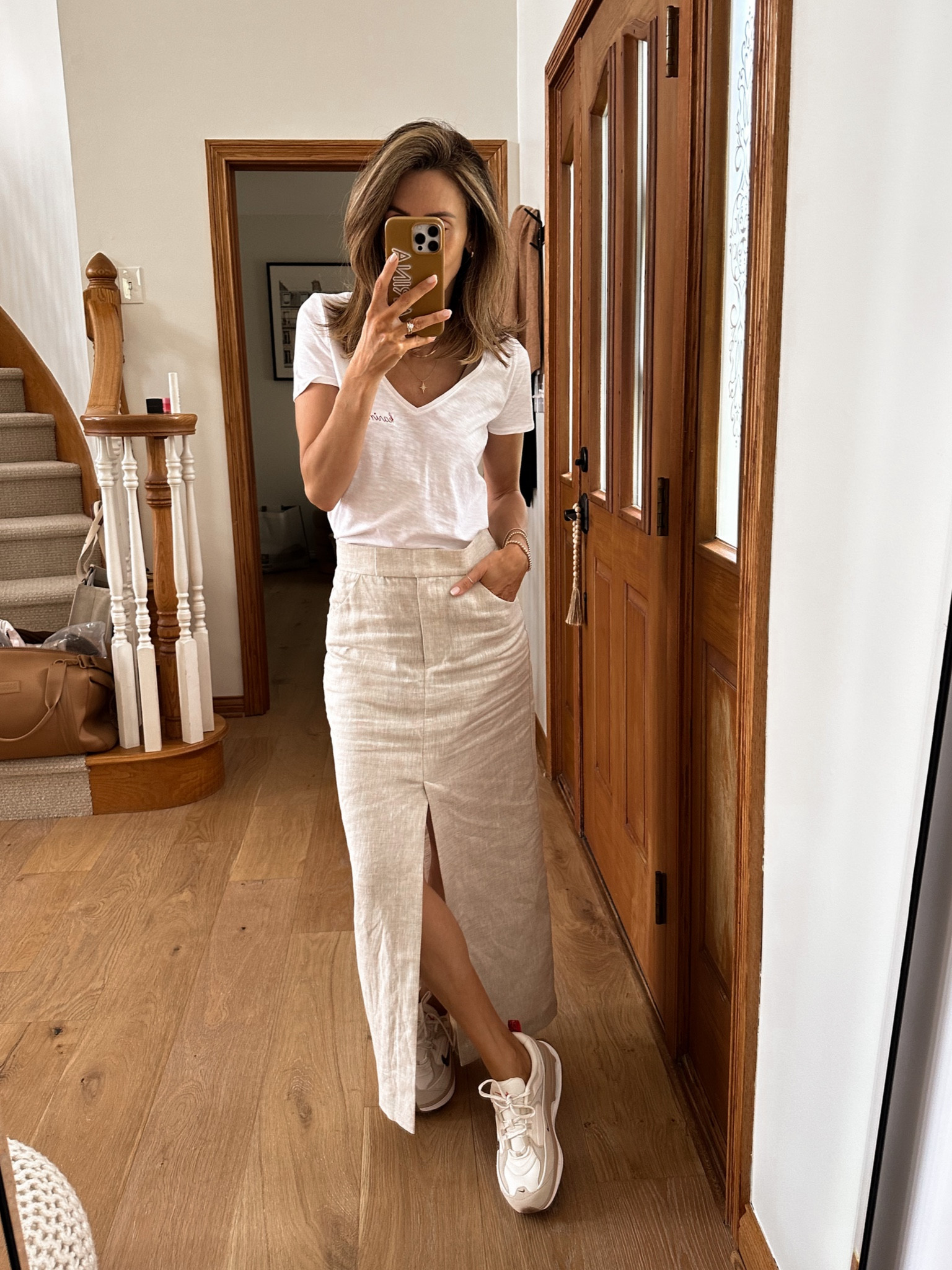 Linen maxi skirt (wore it last night with matching too and so cute!) wearing it more casual w sneaks and a tee as a fresh take from the usual shorts or pants! This look is perfect for summer European travels too! 

#LTKstyletip #LTKshoecrush #LTKtravel