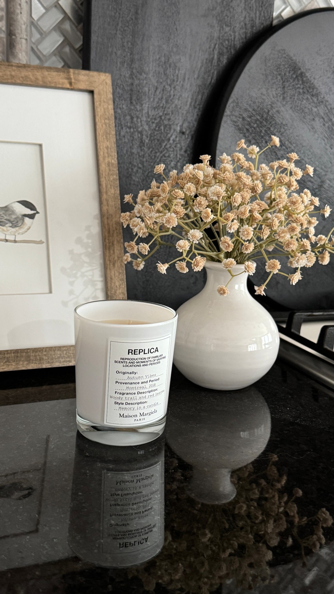 Adding small touches of Autumn to the kitchen 🍂 fall candle, bird artwork, faux fall flowers in a small vase, Pottery Barn wood charcuterie board 

#LTKStyleTip #LTKHome #LTKFindsUnder50