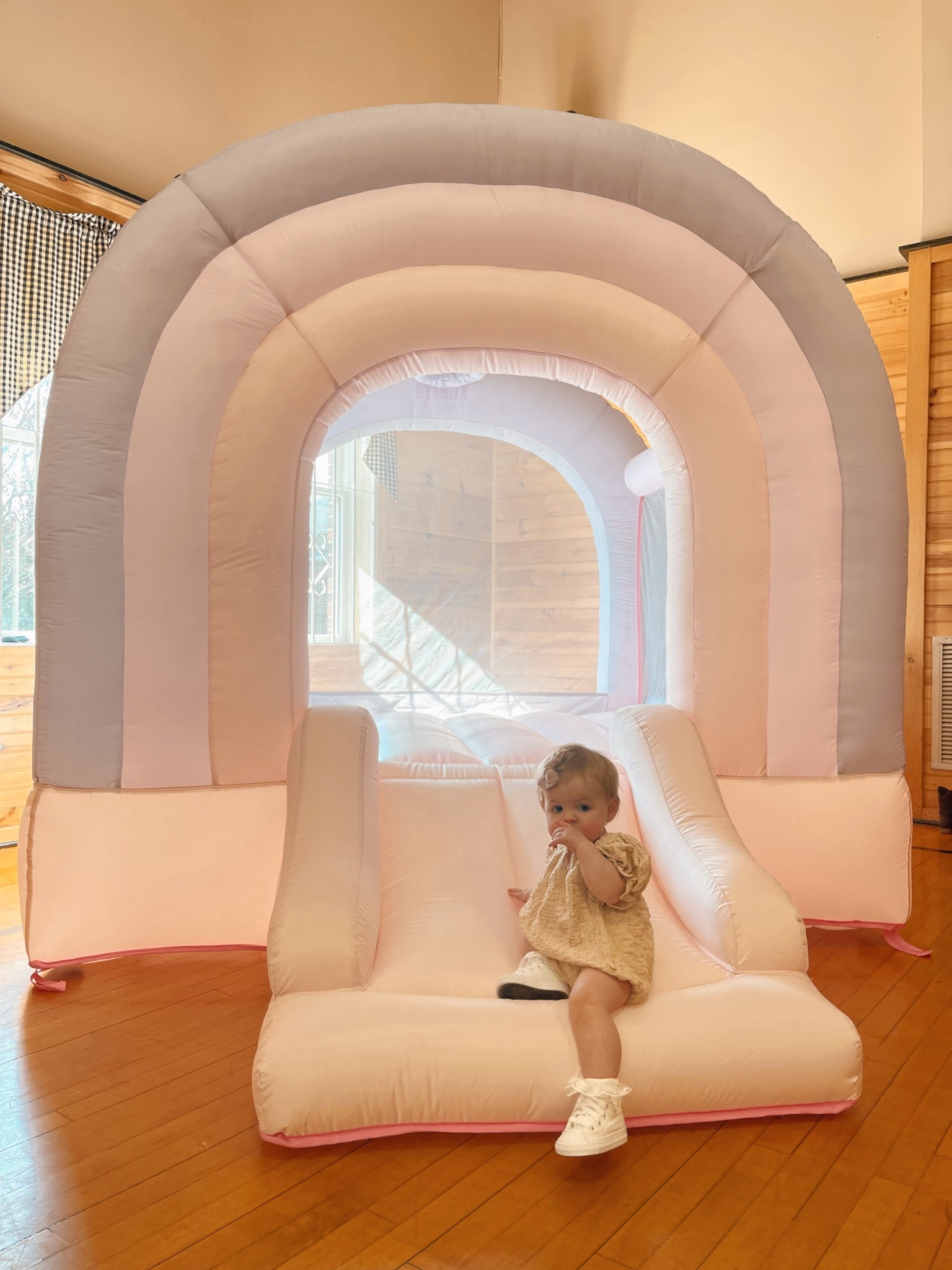 the cutest indoor/outdoor bounce house ✨🌈🤍💗