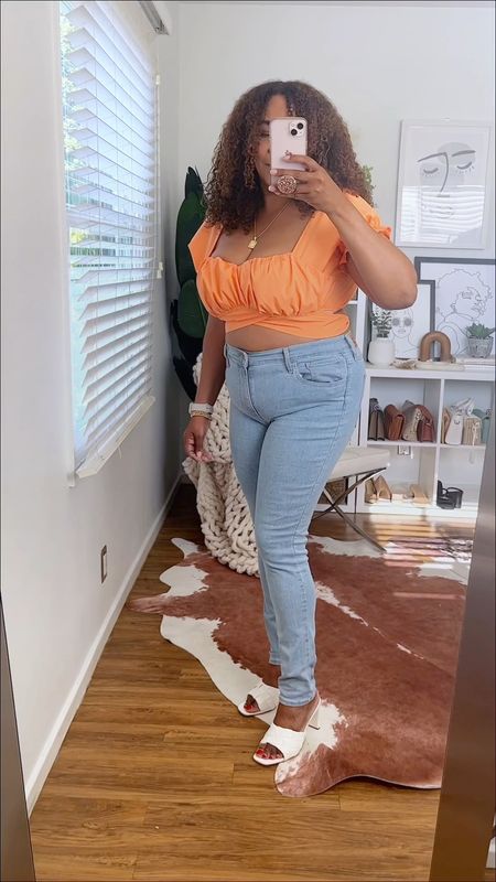 Fun little summer ruffle crop top! Listen, 🙋🏾‍♀️ you can wear a crop top & have curves! Just go with high waisted bottoms. This top comes in a bunch of colors. It’s under $30! Got an xl and 32 in the jeans. 

#LTKcurves #LTKunder50