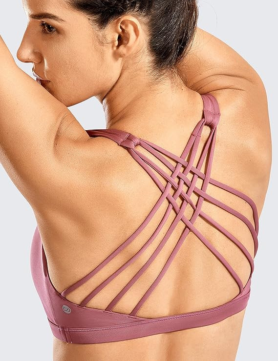CRZ YOGA Strappy Sports Bras for Women Cross Back Sexy Padded Yoga Bra Tops Cute Activewear | Amazon (US)