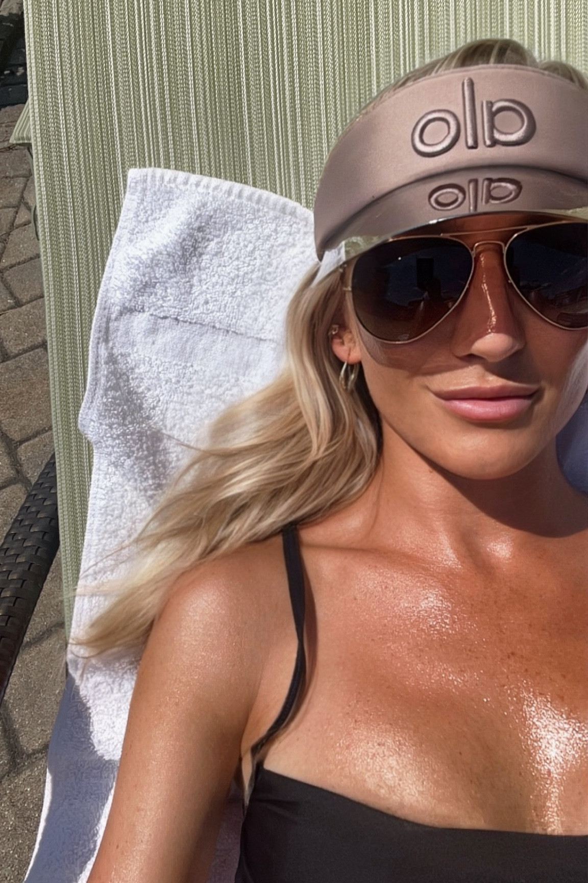 Alo Yoga visor and Ray Ban Aviators with a black swimsuit for the perfect poolside vacation look

#LTKActive #LTKSummerSales #LTKSwim