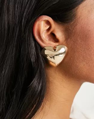 ASOS DESIGN stud earrings with oversized puff heart in gold tone | ASOS | ASOS (Global)