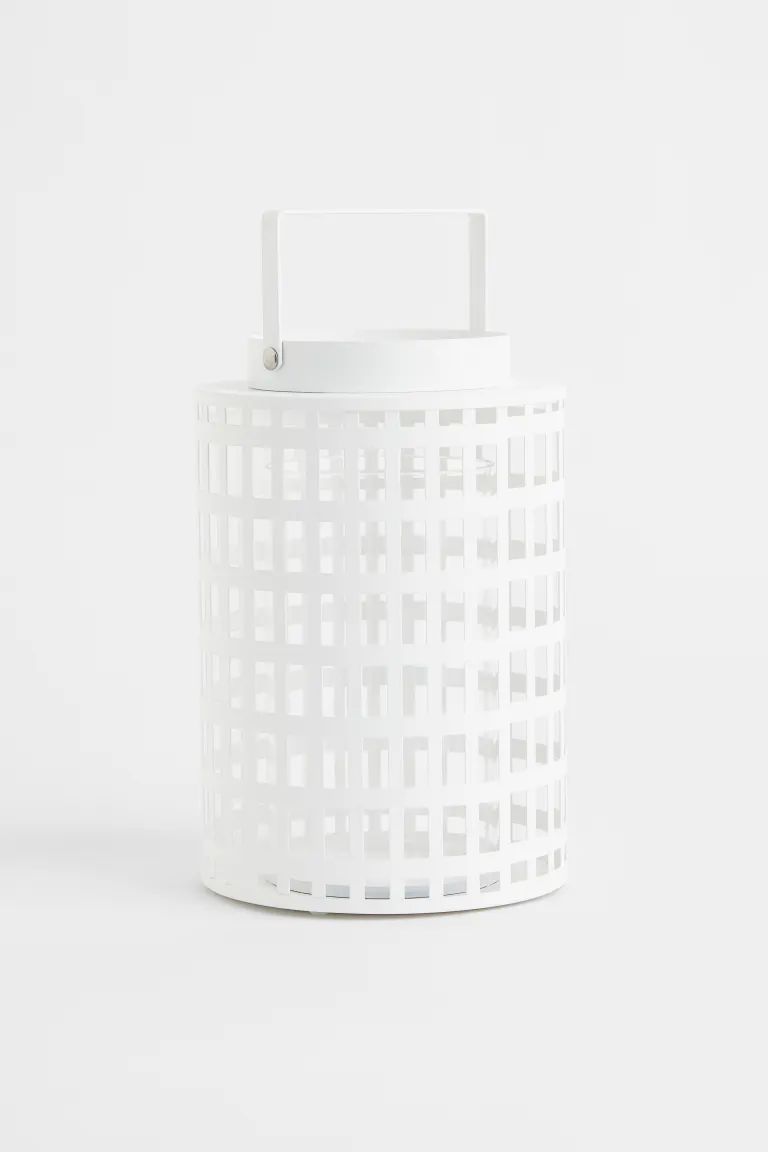 New ArrivalCylindrical candle lantern in metal with a glass candle holder. Spreads soft light, cr... | H&M (US + CA)